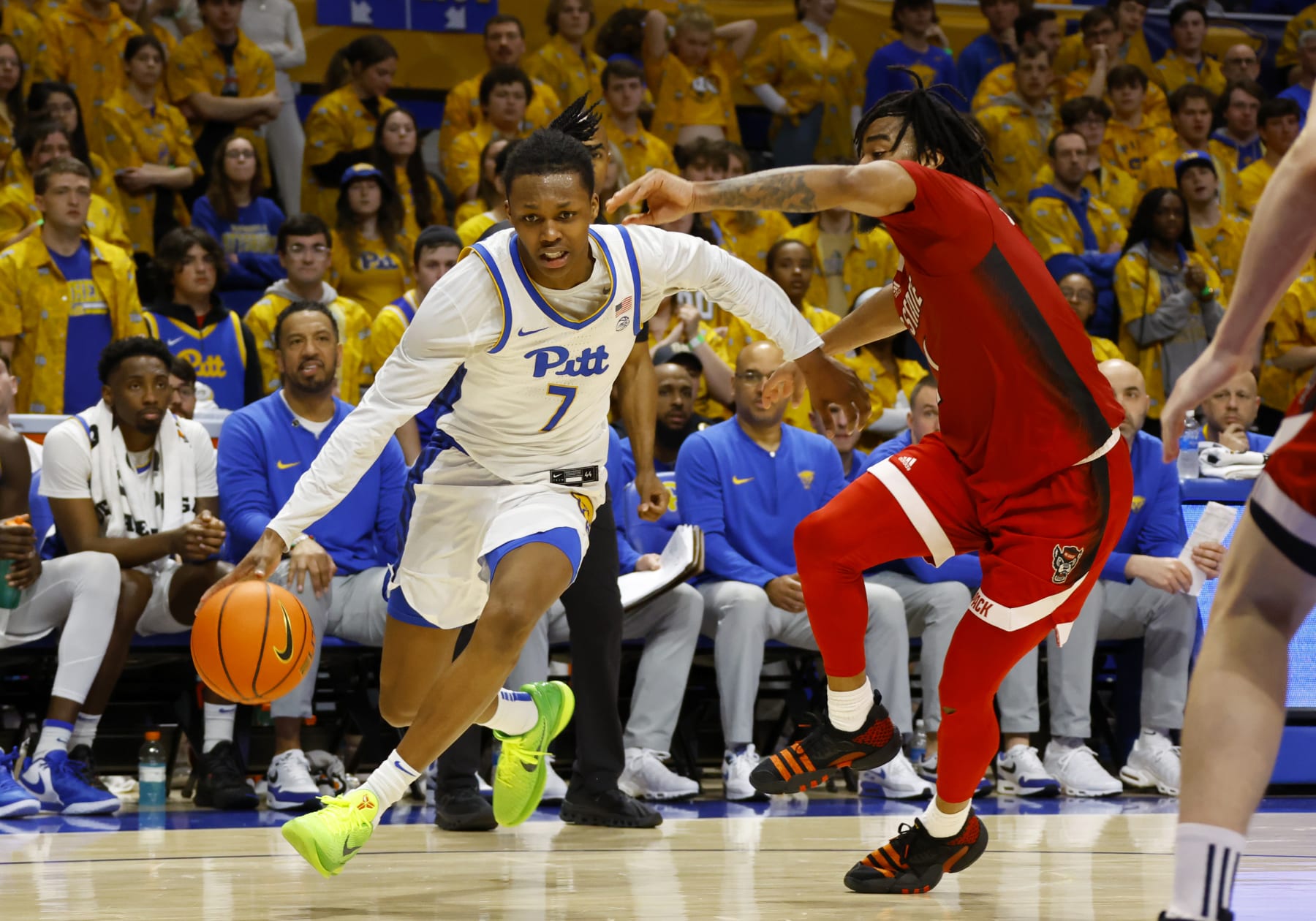 PITTSBURGH, PA - MARCH 09:  Carlton Carrington #7 of the Pittsburgh Panthers drives against the North Carolina State Wolfpack in the second half at Petersen Events Center on March 9, 2024 in Pittsburgh, Pennsylvania.  (Photo by Justin K. Aller/Getty Images)
