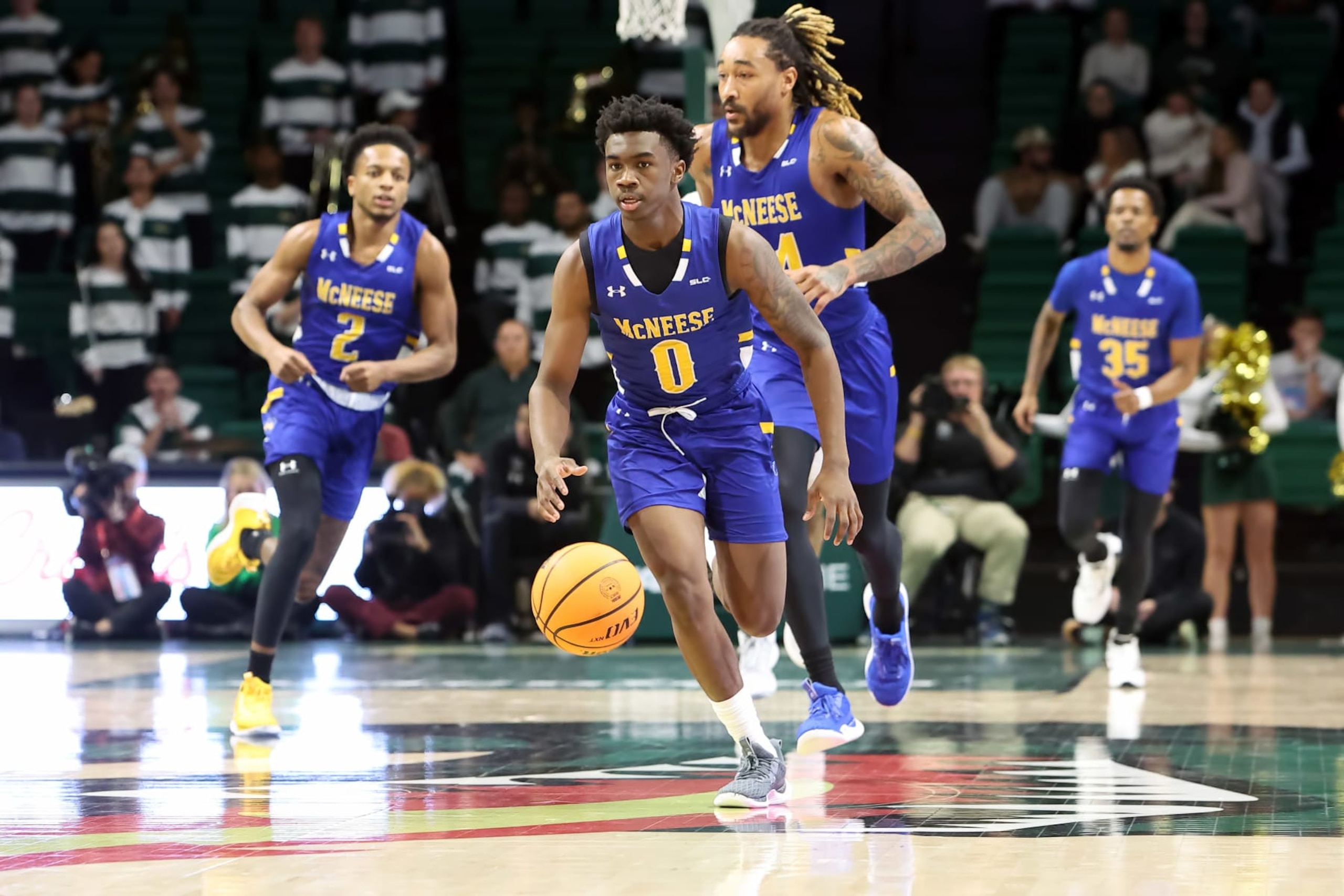 BIRMINGHAM, AL - NOVEMBER 28:  McNeese State Cowboys guard T'Johnn Brown (0) brings the ball up the floor during the game between the UAB Blazers and the McNeese State Cowboys on February 28, 2023 at Bartow Arena in Birmingham, Alabama.  (Photo by Michael Wade/Icon Sportswire via Getty Images)