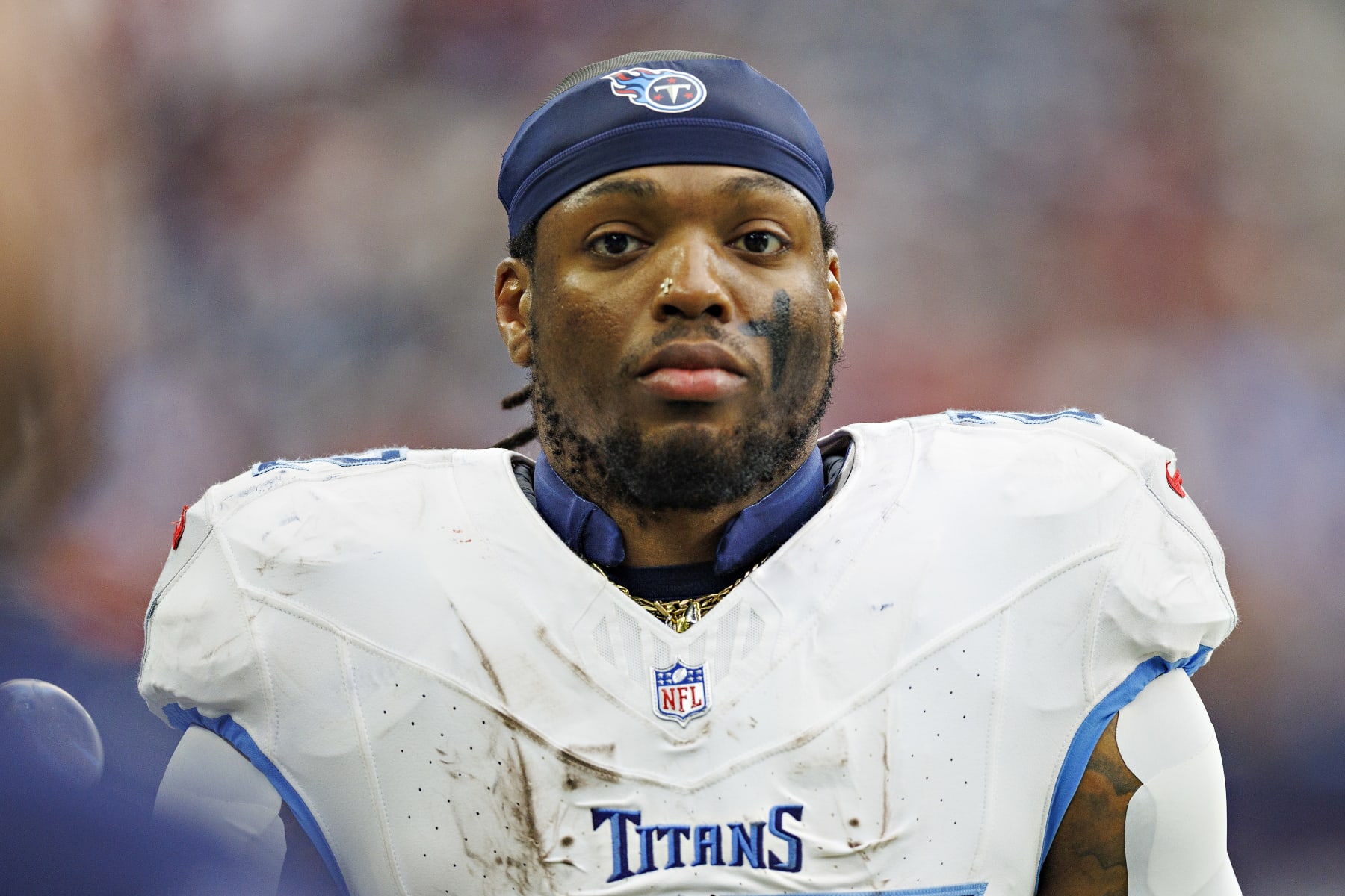 HOUSTON, TEXAS - DECEMBER 31: Derrick Henry #22 of the Tennessee Titans on the sidellne during the game against the Houston Texans at NRG Stadium on December 31, 2023 in Houston, Texas. The Texans defeated the Titans 26-3.  (Photo by Wesley Hitt/Getty Images)
