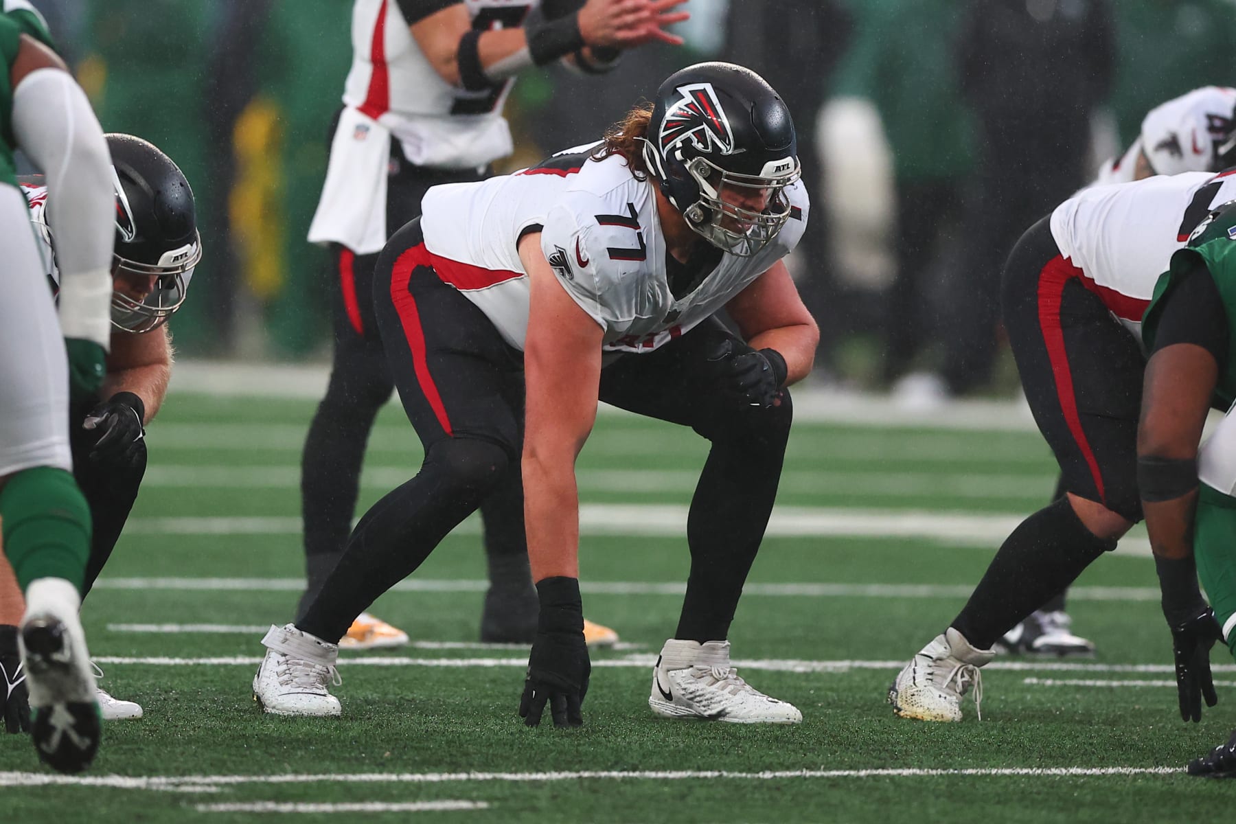 EAST RUTHERFORD, NJ - DECEMBER 03:  Storm Norton #77 of the Atlanta Falcons during the game against the New York Jets on December 3, 2023 at MetLife Stadium in East Rutherford, New Jersey.  (Photo by Rich Graessle/Icon Sportswire via Getty Images)