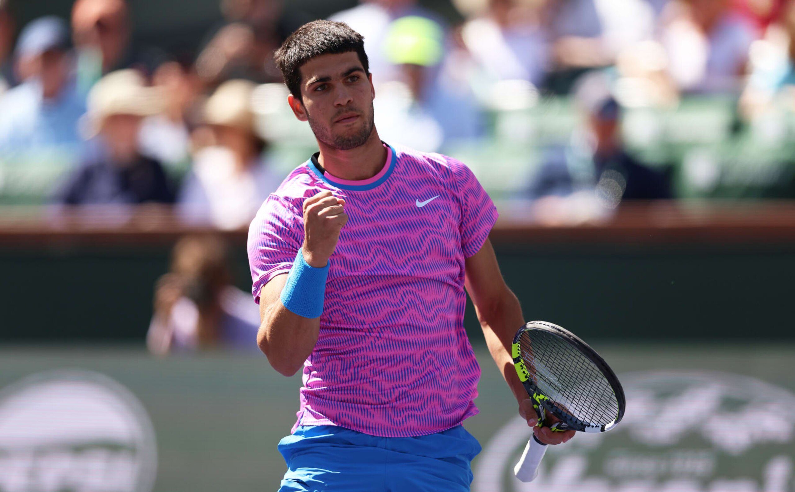 INDIAN WELLS, CALIFORNIA - MARCH 12: Carlos Alcaraz of Spain celebrates a point in the first set against Fabian Marozsan of Hungary in their fourth round match during the BNP Paribas Open at Indian Wells Tennis Garden on March 12, 2024 in Indian Wells, California. (Photo by Clive Brunskill/Getty Images) INDIAN WELLS, CALIFORNIA - MARCH 12: Carlos Alcaraz of Spain celebrates a point in the first set against Fabian Marozsan of Hungary in their fourth round match during the BNP Paribas Open at Indian Wells Tennis Garden on March 12, 2024 in Indian Wells, California. (Photo by Clive Brunskill/Getty Images)