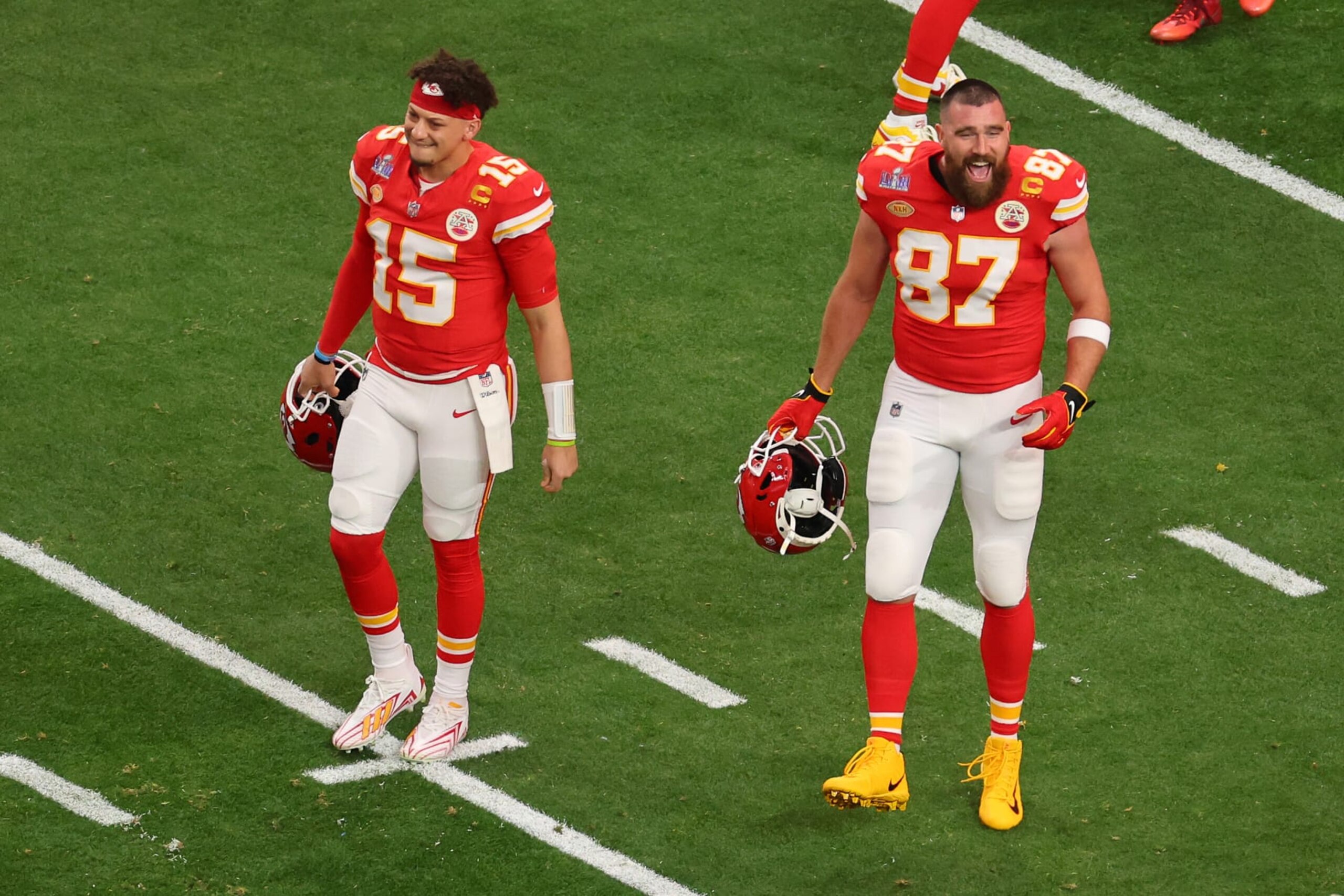 LAS VEGAS, NEVADA - FEBRUARY 11: Patrick Mahomes #15 and Travis Kelce #87 of the Kansas City Chiefs react before Super Bowl LVIII against the San Francisco 49ers at Allegiant Stadium on February 11, 2024 in Las Vegas, Nevada. (Photo by Michael Reaves/Getty Images)