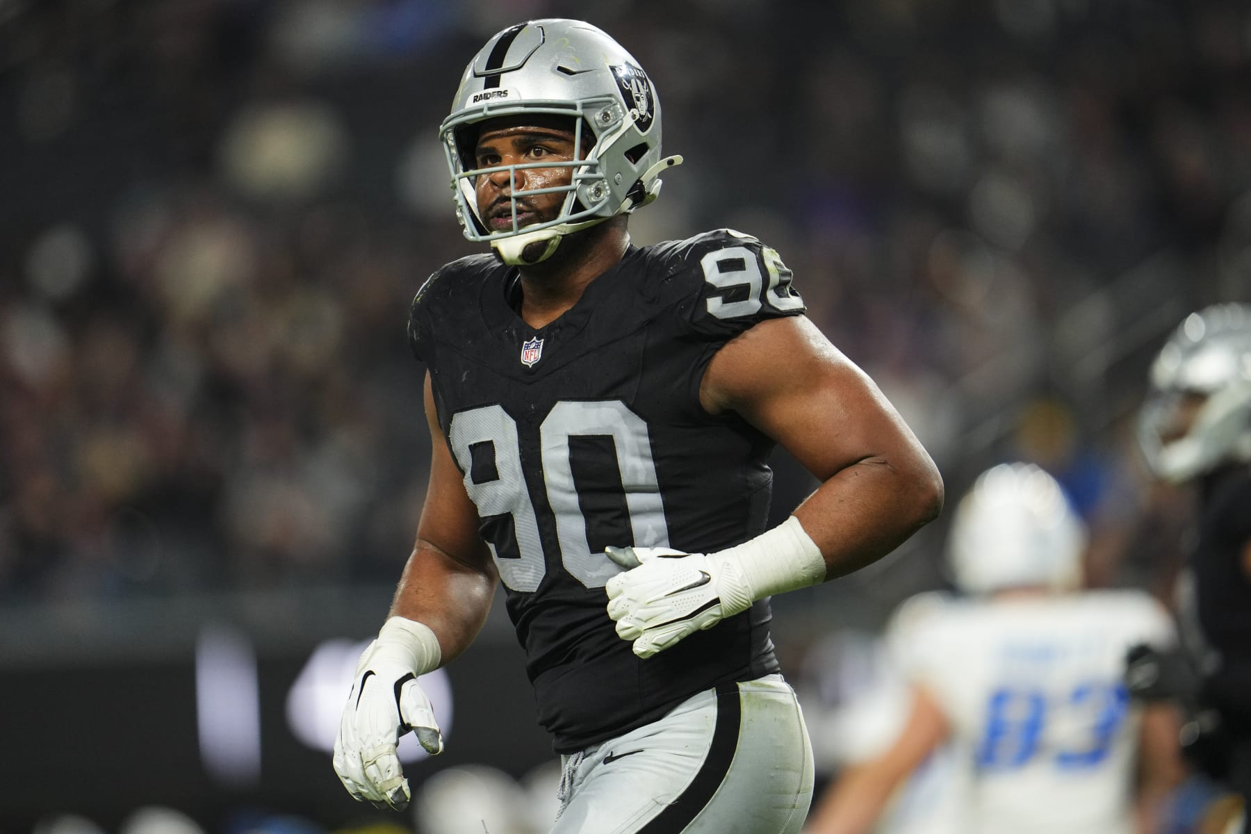 LAS VEGAS, NV - DECEMBER 14: Jerry Tillery #90 of the Las Vegas Raiders looks on from the field during an NFL football game against the Los Angeles Chargers at Allegiant Stadium on December 14, 2023 in Las Vegas, Nevada. (Photo by Cooper Neill/Getty Images)
