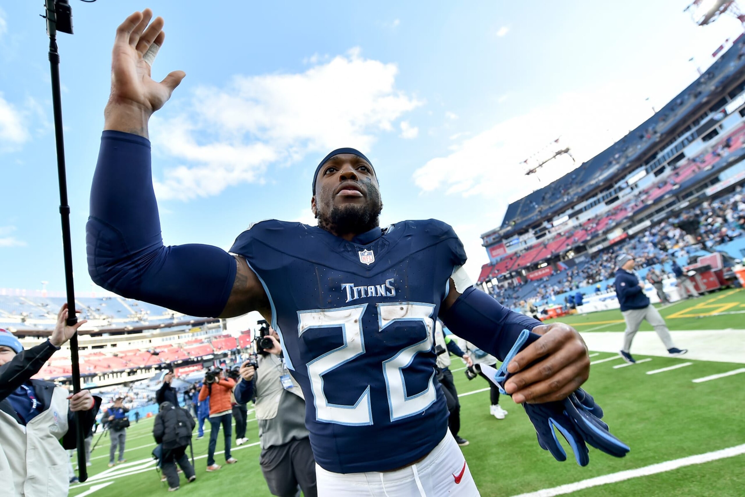 NASHVILLE, TENNESSEE - JANUARY 07: Derrick Henry #22 of the Tennessee Titans waves to fans after the game against the Jacksonville Jaguars at Nissan Stadium on January 07, 2024 in Nashville, Tennessee. (Photo by Justin Ford/Getty Images)
