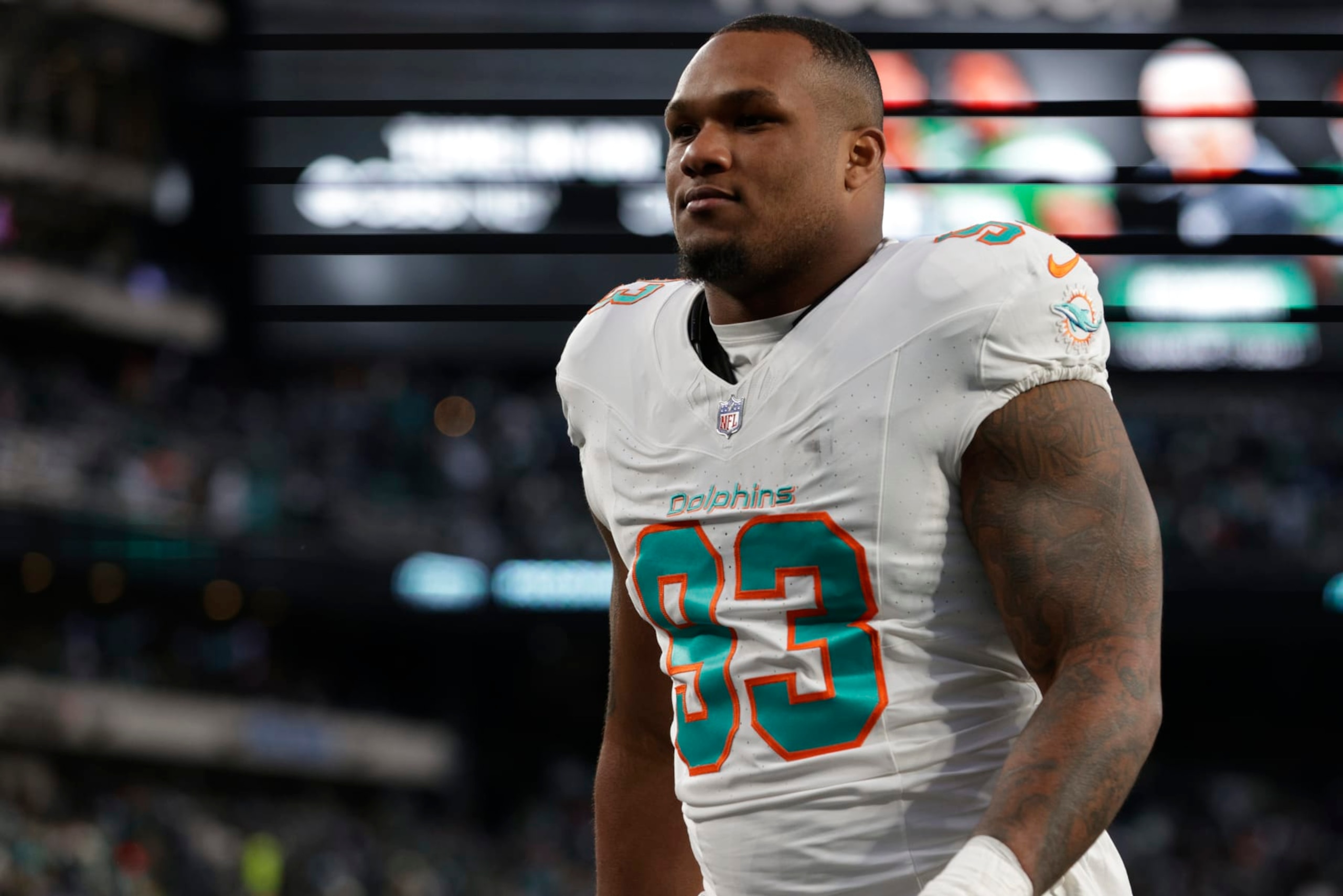 EAST RUTHERFORD, NEW JERSEY - NOVEMBER 24: Defensive tackle Da'Shawn Hand #93 of the Miami Dolphins walks off the field at the end of the first half of a football game against the New York Jets at MetLife Stadium on November 24, 2023 in East Rutherford, New Jersey. (Photo by Rich Schultz/Getty Images)