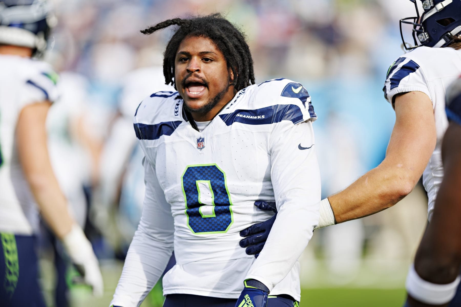 NASHVILLE, TENNESSEE - DECEMBER 24: Devin Bush #0 of the Seattle Seahawks has a conversation with the Titans bench during the game against the Tennessee Titans at Nissan Stadium on December 24, 2023 in Nashville, Tennessee. The Seahawks defeated the Titans 20-17. (Photo by Wesley Hitt/Getty Images) NASHVILLE, TENNESSEE - DECEMBER 24: Devin Bush #0 of the Seattle Seahawks has a conversation with the Titans bench during the game against the Tennessee Titans at Nissan Stadium on December 24, 2023 in Nashville, Tennessee. The Seahawks defeated the Titans 20-17. (Photo by Wesley Hitt/Getty Images)
