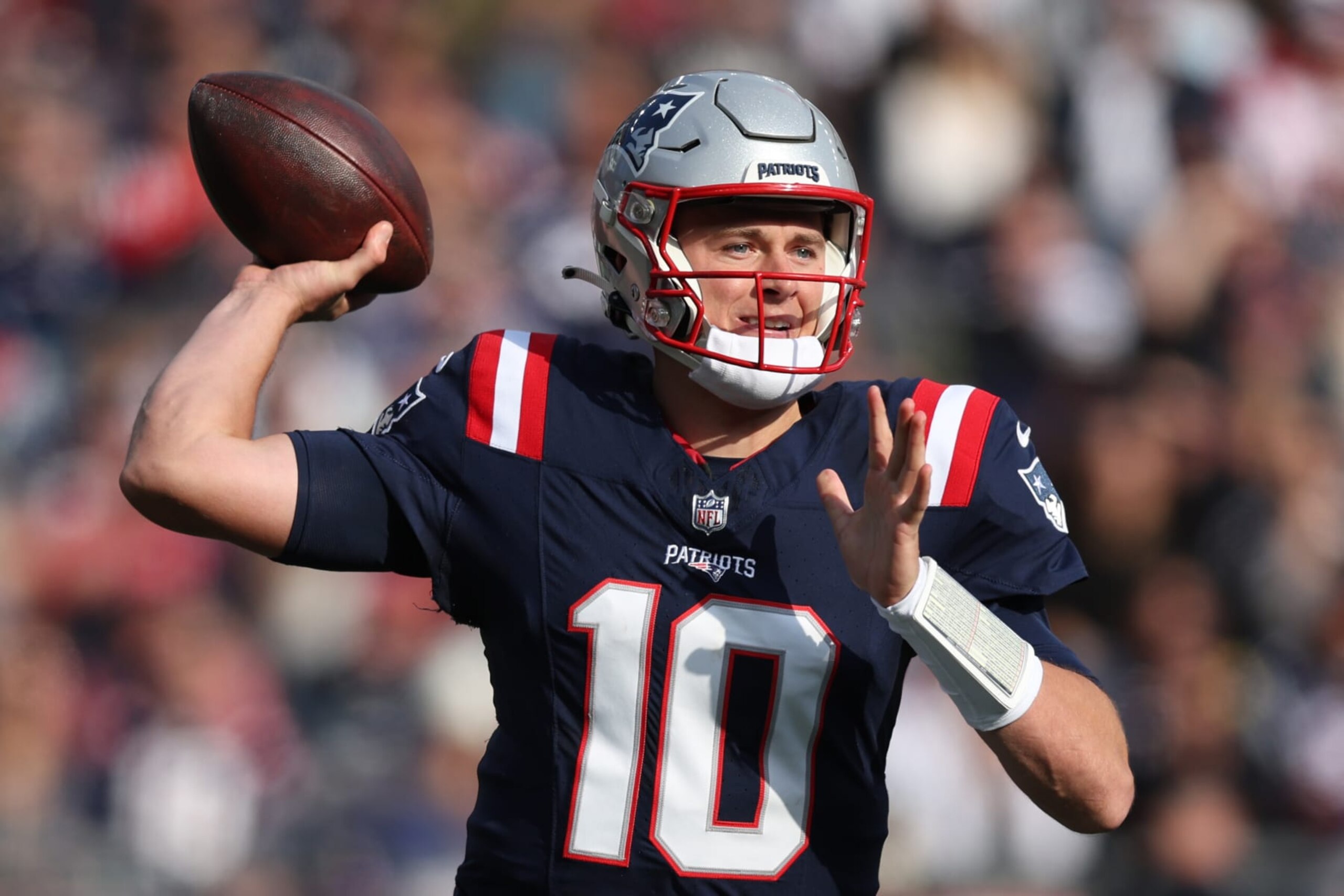 FOXBOROUGH, MASSACHUSETTS - NOVEMBER 05: Mac Jones #10 of the New England Patriots looks to throw a pass during the game against the Washington Commanders at Gillette Stadium on November 05, 2023 in Foxborough, Massachusetts. (Photo by Adam Glanzman/Getty Images)