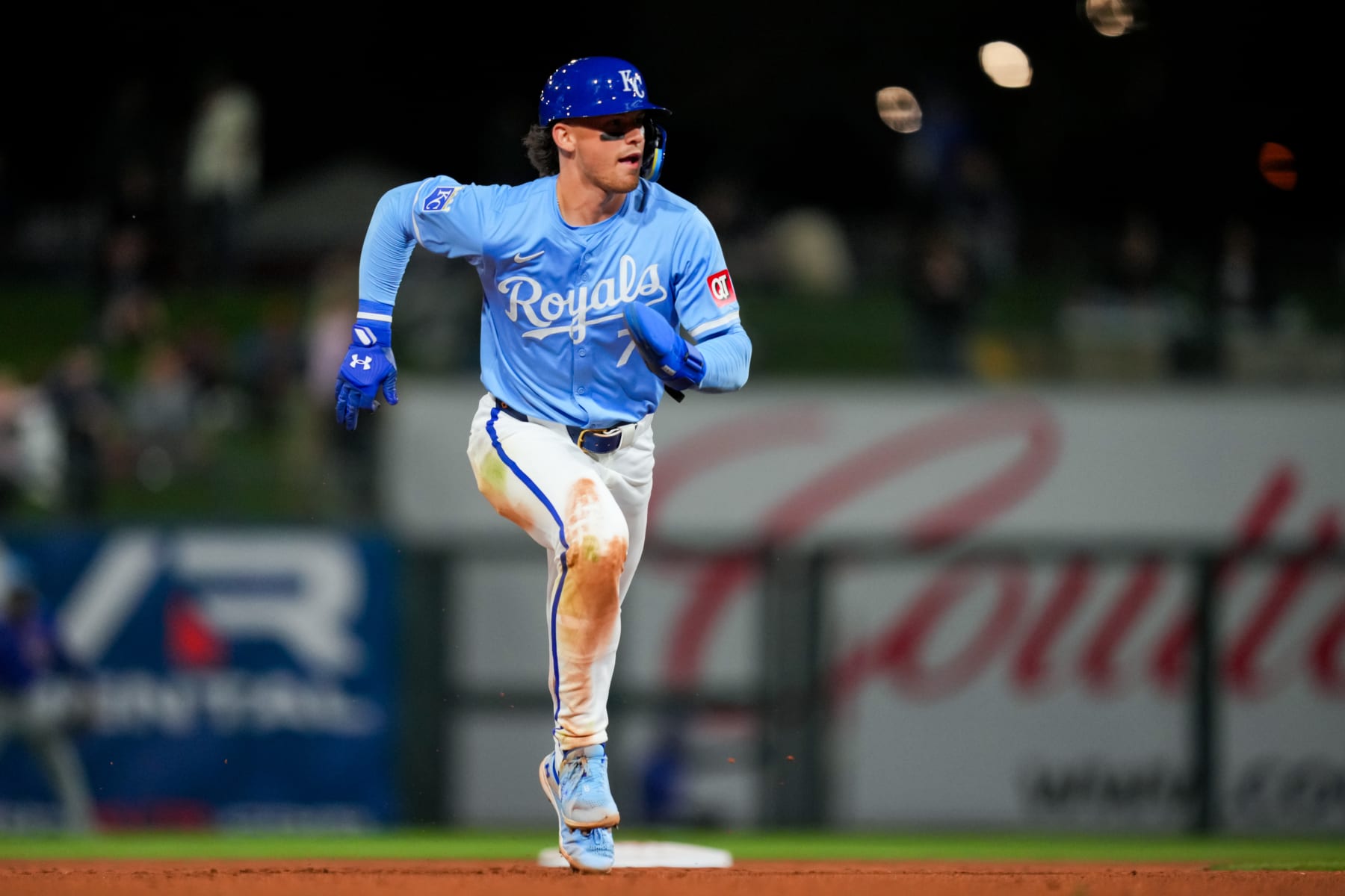 SURPRISE, ARIZONA - MARCH 05: Bobby Witt Jr. #7 of the Kansas City Royals advances to third base on a wild pitch in the sixth inning during a spring training game against the Chicago Cubs at Surprise Stadium on March 05, 2024 in Surprise, Arizona. (Photo by Aaron Doster/Getty Images)