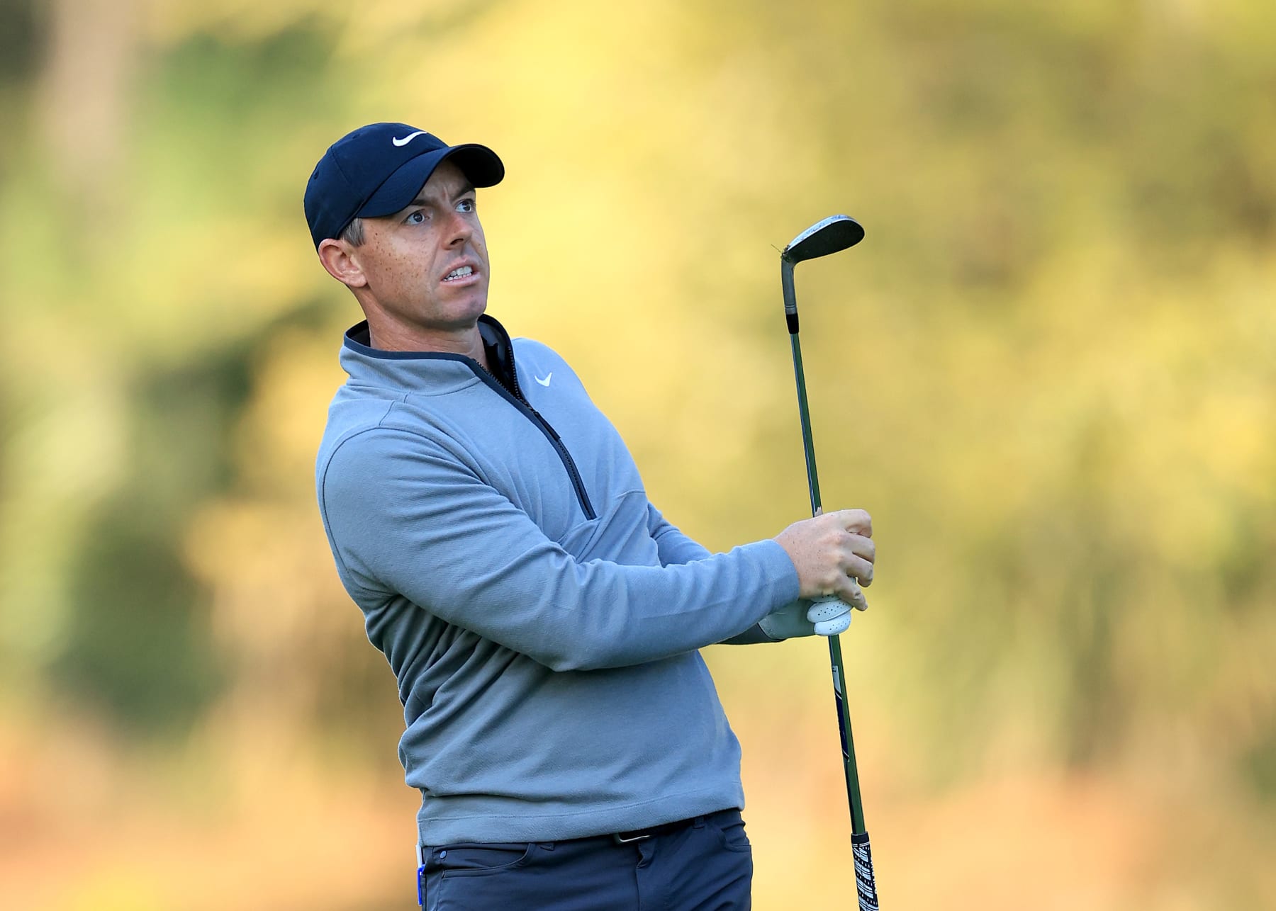 PONTE VEDRA BEACH, FLORIDA - MARCH 14: Rory McIlroy of Northern Ireland plays his second shot on the 10th hole during the first round of THE PLAYERS Championship on the Stadium Course at TPC Sawgrass on March 14, 2024 in Ponte Vedra Beach, Florida. (Photo by David Cannon/Getty Images)