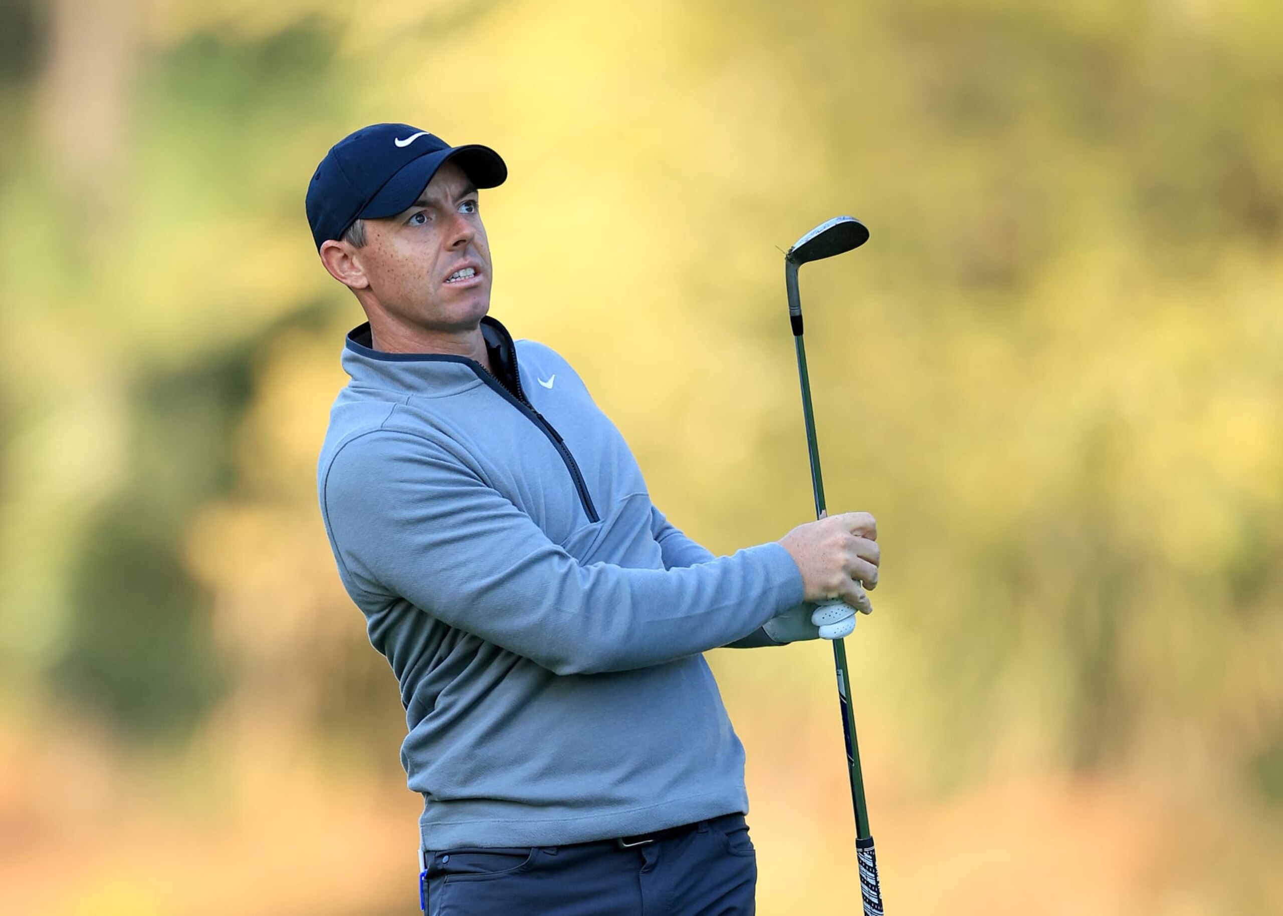 PONTE VEDRA BEACH, FLORIDA - MARCH 14: Rory McIlroy of Northern Ireland plays his second shot on the 10th hole during the first round of THE PLAYERS Championship on the Stadium Course at TPC Sawgrass on March 14, 2024 in Ponte Vedra Beach, Florida. (Photo by David Cannon/Getty Images)