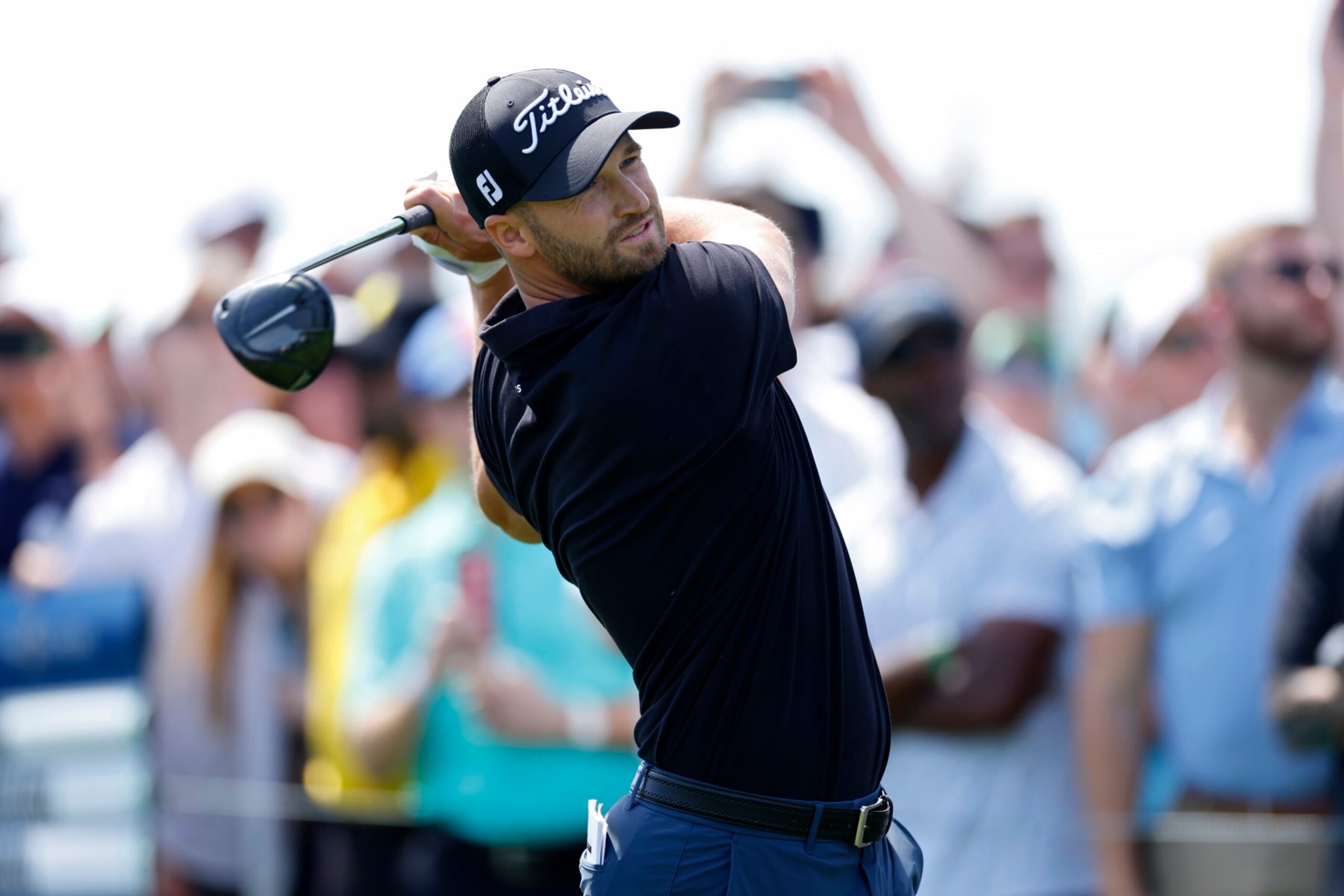 PONTE VEDRA BEACH, FLORIDA - MARCH 14: Wyndham Clark of the United States plays his shot from the first tee during the first round of THE PLAYERS Championship on the Stadium Course at TPC Sawgrass on March 14, 2024 in Ponte Vedra Beach, Florida. (Photo by Mike Ehrmann/Getty Images)