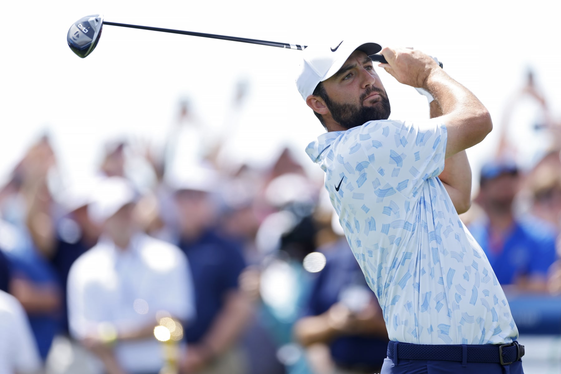 PONTE VEDRA BEACH, FLORIDA - MARCH 14: Scottie Scheffler of the United States plays his shot from the first tee during the first round of THE PLAYERS Championship on the Stadium Course at TPC Sawgrass on March 14, 2024 in Ponte Vedra Beach, Florida. (Photo by Mike Ehrmann/Getty Images)