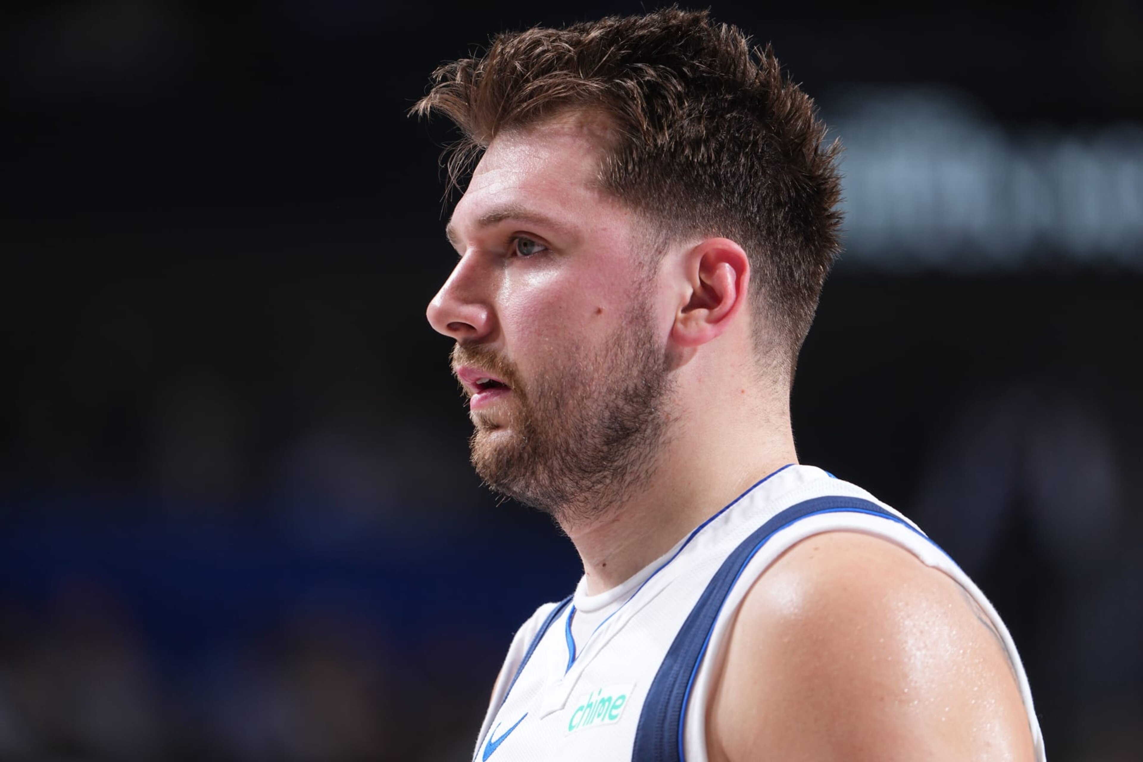 DALLAS, TX - MARCH 13: Luka Doncic #77 of the Dallas Mavericks looks on during the game against the Golden State Warriors on March 13, 2024 at the American Airlines Center in Dallas, Texas. NOTE TO USER: User expressly acknowledges and agrees that, by downloading and or using this photograph, User is consenting to the terms and conditions of the Getty Images License Agreement. Mandatory Copyright Notice: Copyright 2024 NBAE (Photo by Glenn James/NBAE via Getty Images) DALLAS, TX - MARCH 13: Luka Doncic #77 of the Dallas Mavericks looks on during the game against the Golden State Warriors on March 13, 2024 at the American Airlines Center in Dallas, Texas. NOTE TO USER: User expressly acknowledges and agrees that, by downloading and or using this photograph, User is consenting to the terms and conditions of the Getty Images License Agreement. Mandatory Copyright Notice: Copyright 2024 NBAE (Photo by Glenn James/NBAE via Getty Images)