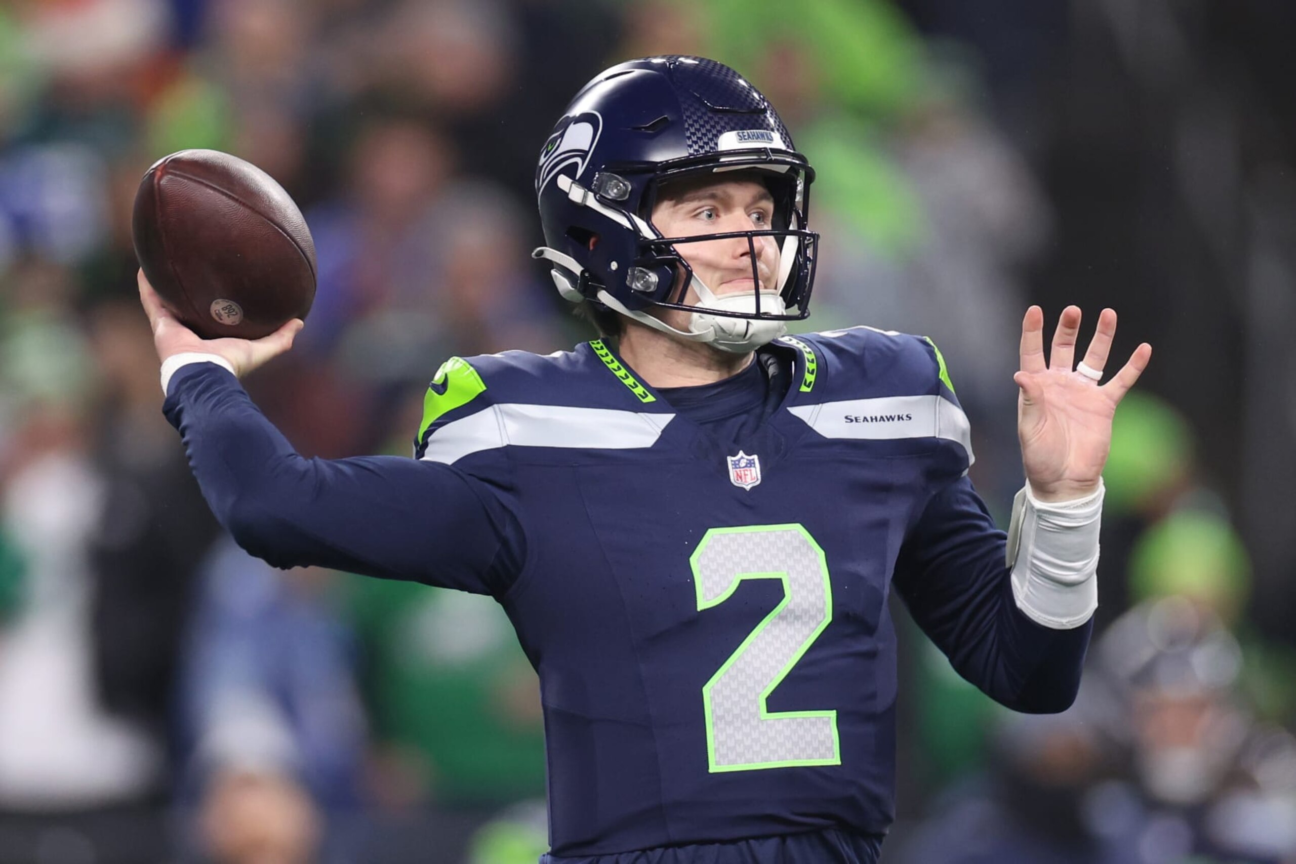 SEATTLE, WASHINGTON - DECEMBER 18: Drew Lock #2 of the Seattle Seahawks looks to pass in the first quarter against the Philadelphia Eagles at Lumen Field on December 18, 2023 in Seattle, Washington. (Photo by Steph Chambers/Getty Images)