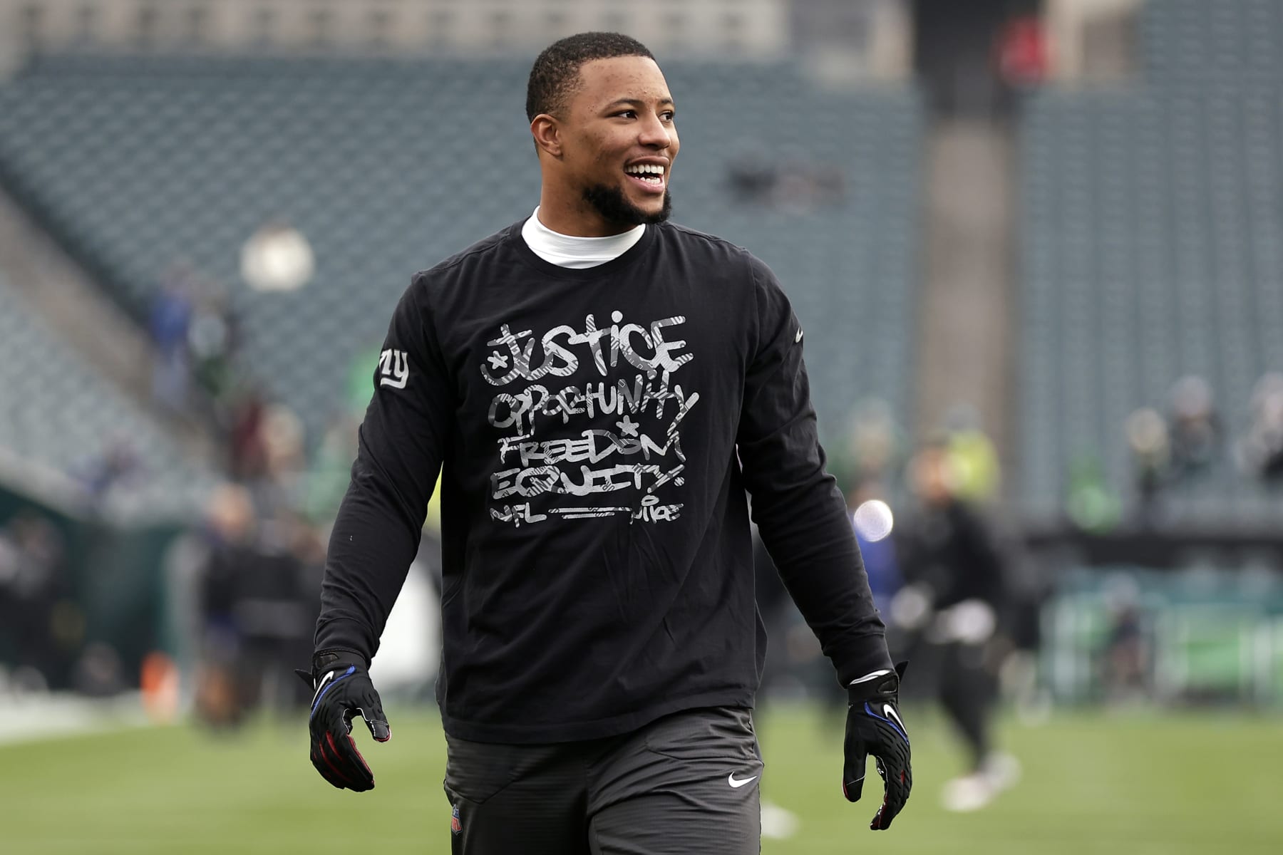PHILADELPHIA, PENNSYLVANIA - DECEMBER 25: Saquon Barkley #26 of the New York Giants warms up before taking on the Philadelphia Eagles at Lincoln Financial Field on December 25, 2023 in Philadelphia, Pennsylvania. (Photo by Adam Hunger/Getty Images)