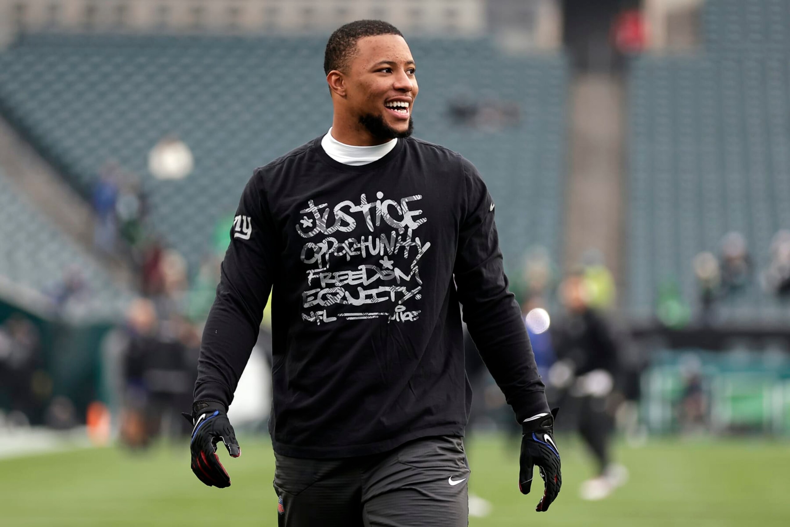 PHILADELPHIA, PENNSYLVANIA - DECEMBER 25: Saquon Barkley #26 of the New York Giants warms up before taking on the Philadelphia Eagles at Lincoln Financial Field on December 25, 2023 in Philadelphia, Pennsylvania. (Photo by Adam Hunger/Getty Images)