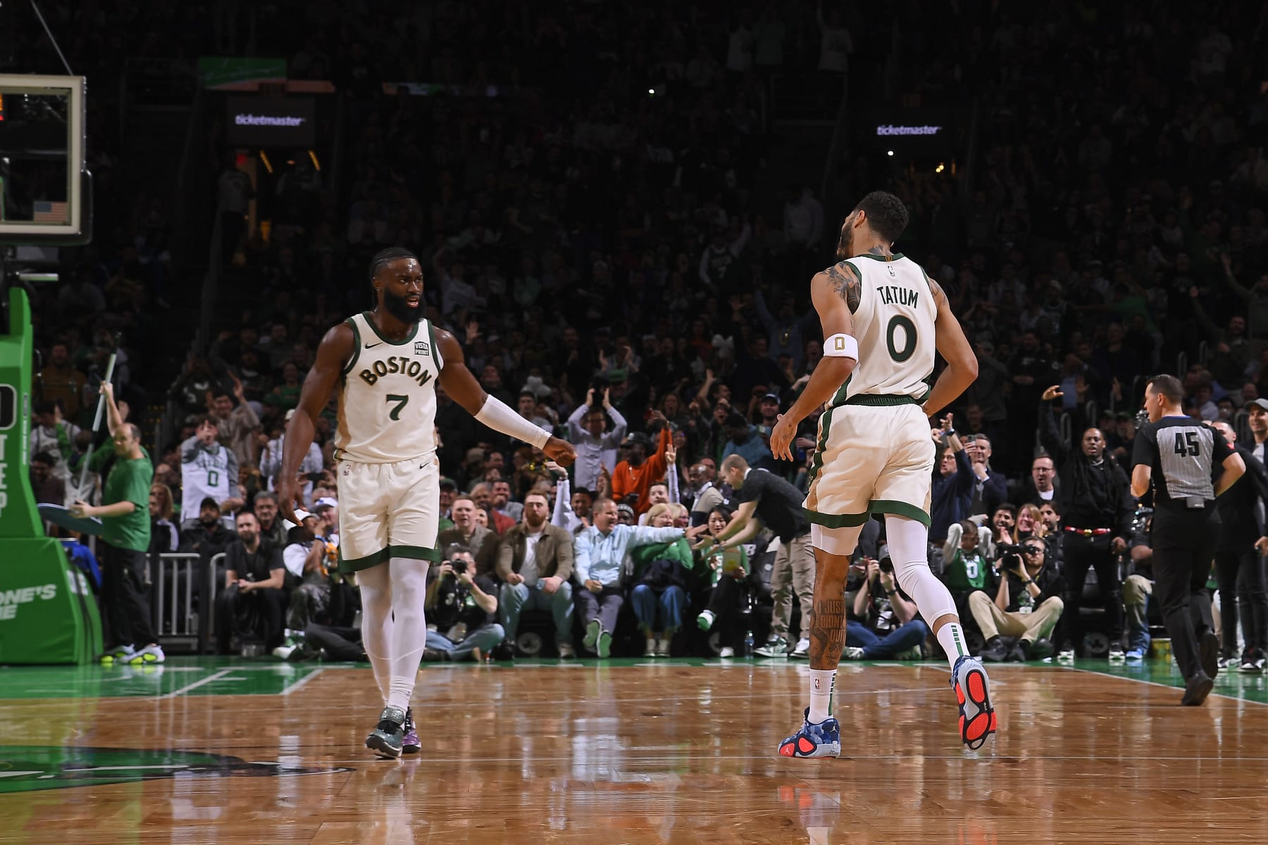 BOSTON, MA - MARCH 14: Jayson Tatum #0 and Jaylen Brown #7 of the Boston Celtics celebrates during the game against the Phoenix Suns on March 14, 2024 at the TD Garden in Boston, Massachusetts. NOTE TO USER: User expressly acknowledges and agrees that, by downloading and or using this photograph, User is consenting to the terms and conditions of the Getty Images License Agreement. Mandatory Copyright Notice: Copyright 2024 NBAE  (Photo by Brian Babineau/NBAE via Getty Images)