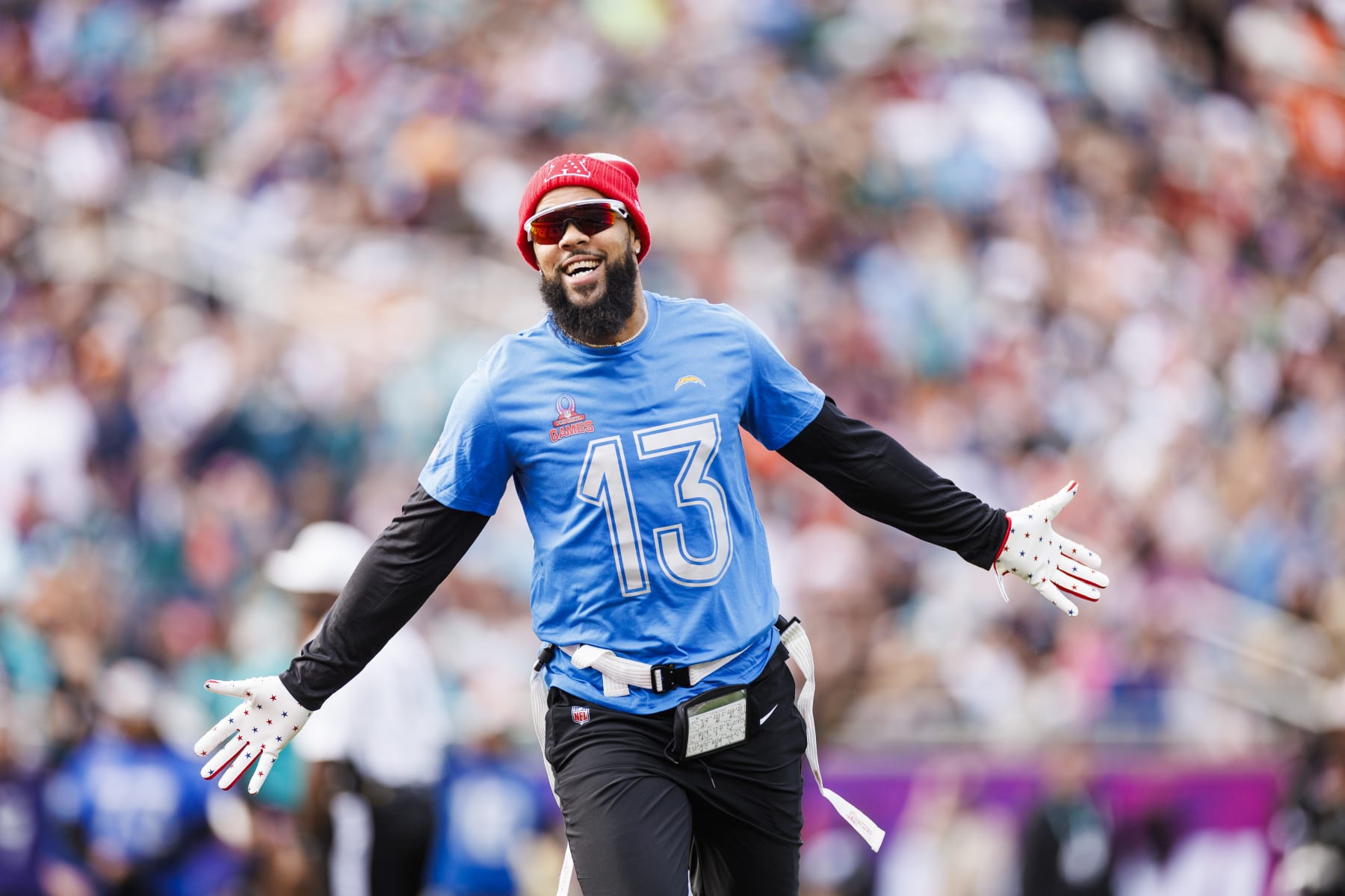 ORLANDO, FLORIDA - FEBRUARY 04: Keenan Allen #13 of the Los Angeles Chargers and AFC celebrates a touchdown during the 2024 NFL Pro Bowl at Camping World Stadium on February 04, 2024 in Orlando, Florida. (Photo by James Gilbert/Getty Images)