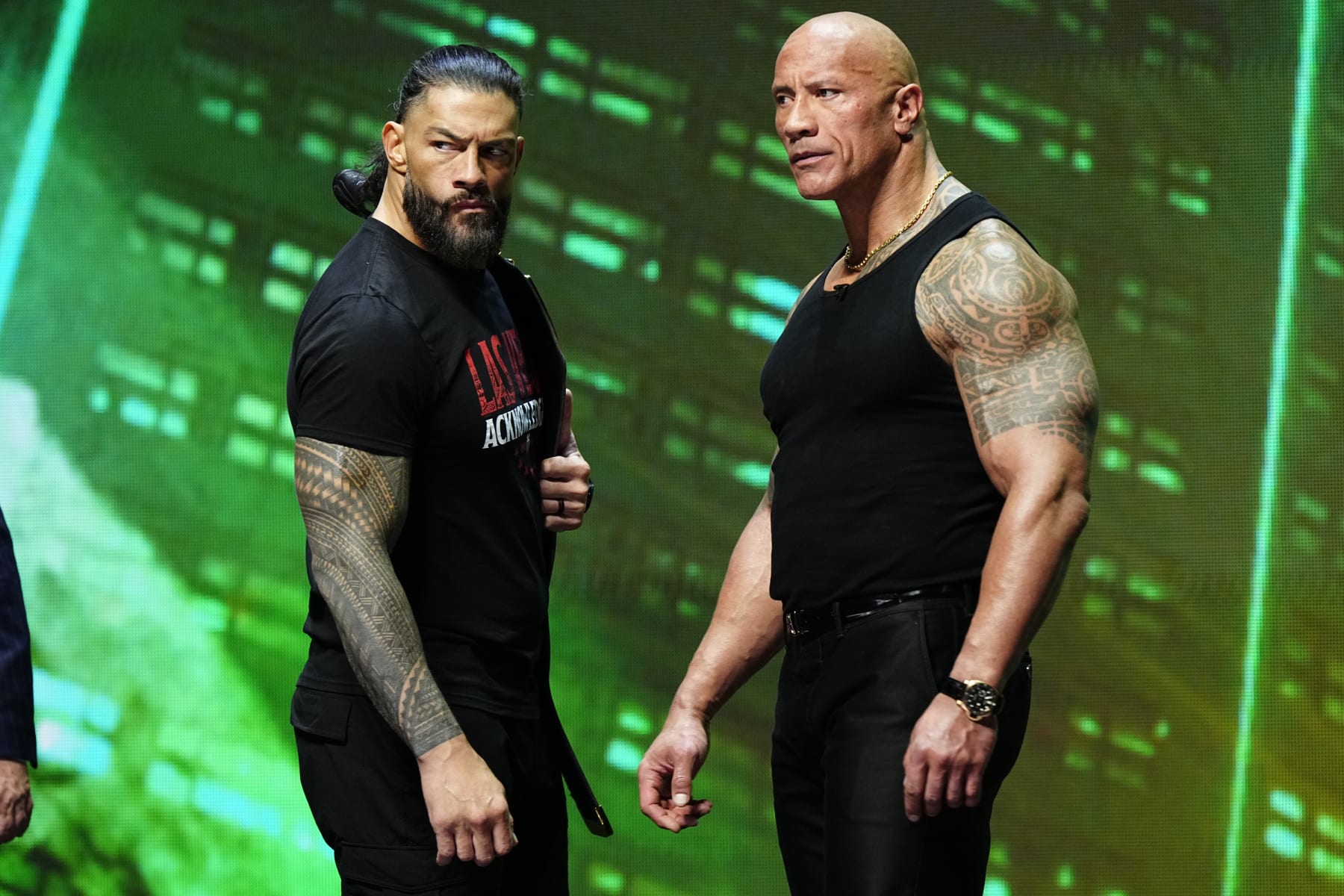 LAS VEGAS, NV - FEBRUARY 08:  Dwayne "The Rock" Johnson and Roman Reigns during the WWE Wrestlemania XL Kickoff on February 08, 2024, at T-Mobile Arena in Las Vegas, NV. (Photo by Louis Grasse/PXimages/Icon Sportswire via Getty Images)