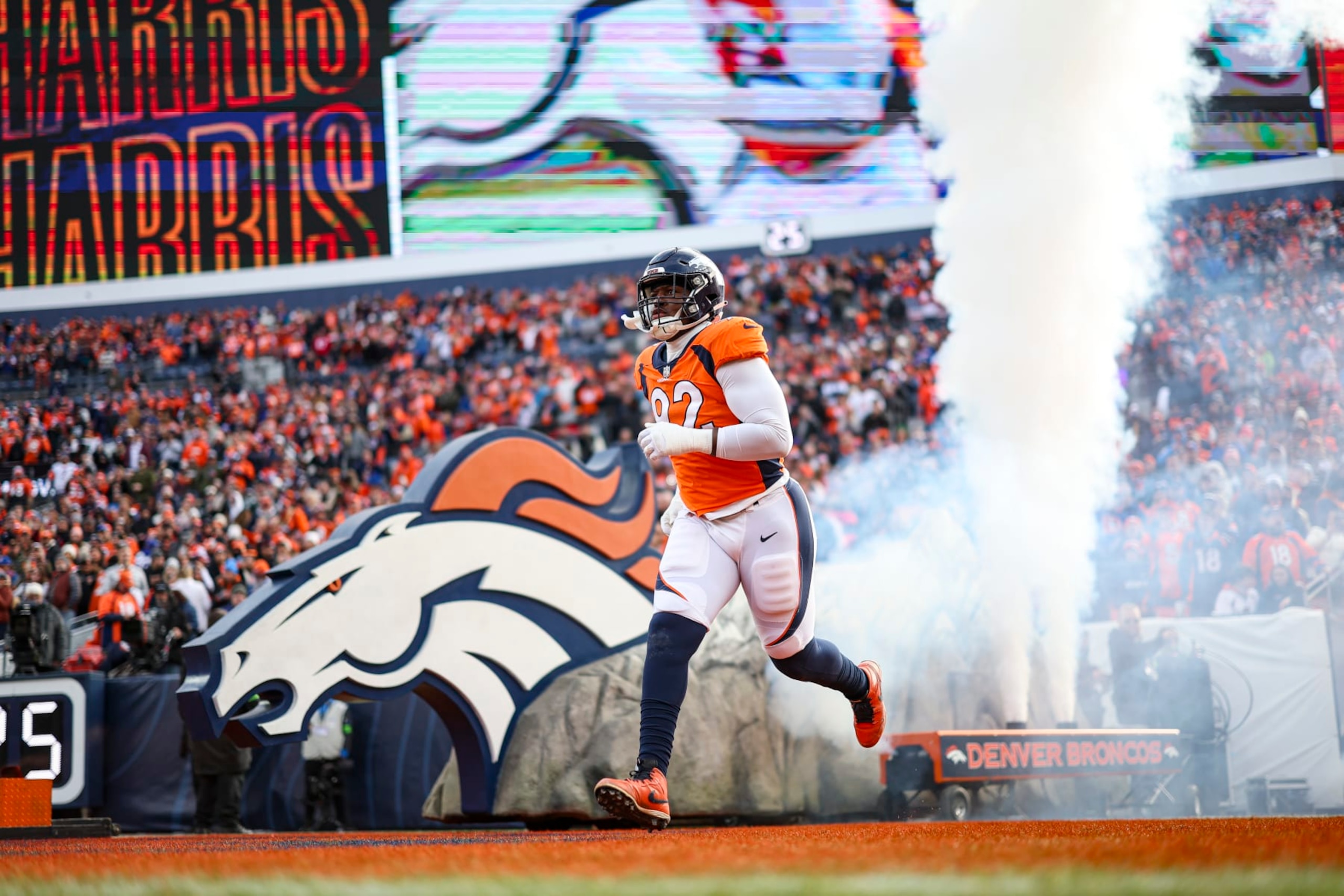 DENVER, CO - DECEMBER 31: Jonathan Harris #92 of the Denver Broncos runs out of the tunnel prior to an NFL football game against the Los Angeles Chargers at Empower Field at Mile High on December 31, 2023 in Denver, Colorado. (Photo by Perry Knotts/Getty Images)