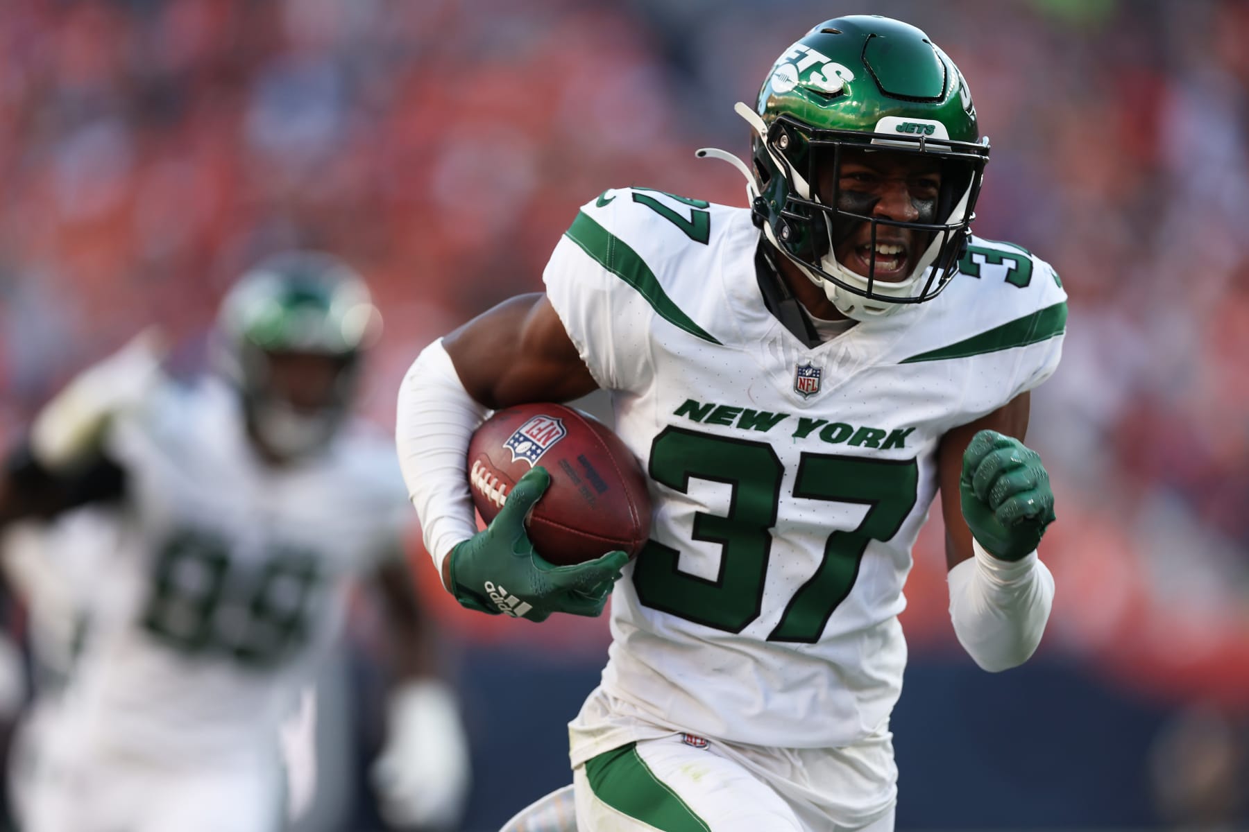 DENVER, COLORADO - OCTOBER 08: Bryce Hall #37 of the New York Jets runs with the ball after recovering a fumble in the fourth quarter against the Denver Broncos at Empower Field At Mile High on October 08, 2023 in Denver, Colorado. (Photo by Matthew Stockman/Getty Images) DENVER, COLORADO - OCTOBER 08: Bryce Hall #37 of the New York Jets runs with the ball after recovering a fumble in the fourth quarter against the Denver Broncos at Empower Field At Mile High on October 08, 2023 in Denver, Colorado. (Photo by Matthew Stockman/Getty Images)