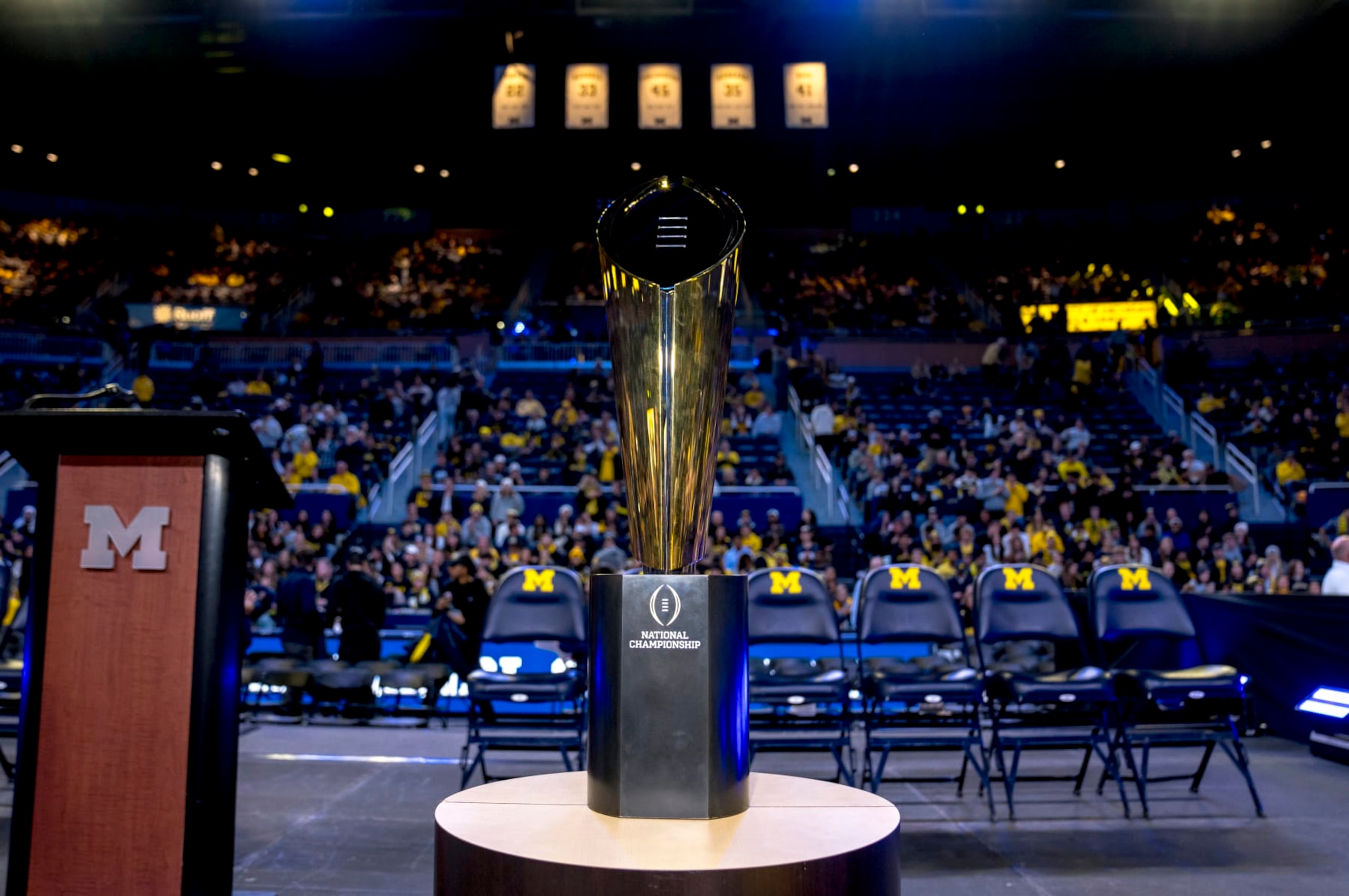 ANN ARBOR, MICHIGAN - JANUARY 13: The College Football Playoff National Championship Trophy is displayed during the Michigan Wolverines football National Championship celebration on January 13, 2024 at Crisler Center in Ann Arbor, Michigan. (Photo by Nic Antaya/Getty Images)