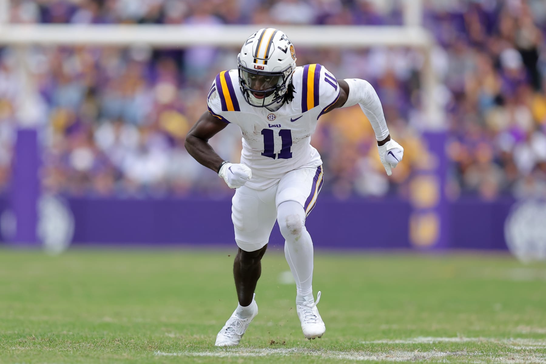 BATON ROUGE, LOUISIANA - NOVEMBER 25: Brian Thomas Jr. #11 of the LSU Tigers in action against the Texas A&M Aggies during a game at Tiger Stadium on November 25, 2023 in Baton Rouge, Louisiana. (Photo by Jonathan Bachman/Getty Images)
