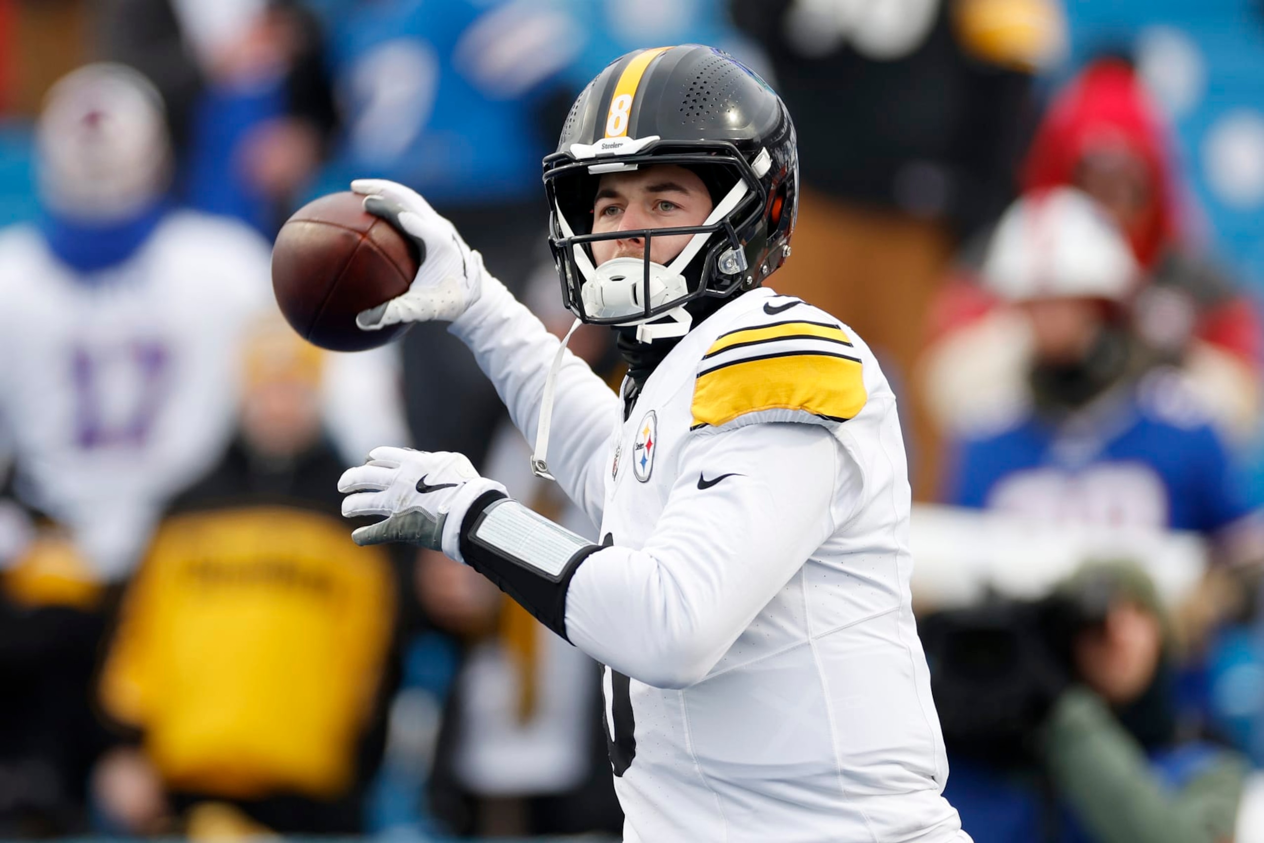 ORCHARD PARK, NEW YORK - JANUARY 15: Kenny Pickett #8 of the Pittsburgh Steelers warms up before the game against the Buffalo Bills at Highmark Stadium on January 15, 2024 in Orchard Park, New York. (Photo by Sarah Stier/Getty Images)