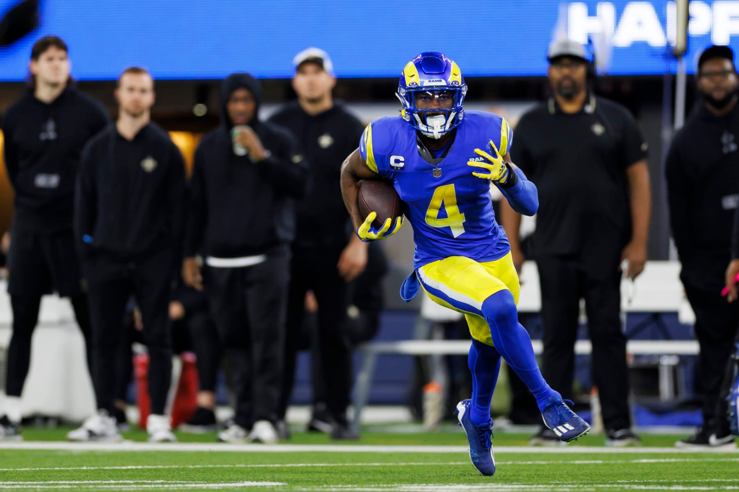 INGLEWOOD, CA - DECEMBER 21: Jordan Fuller #4 of the Los Angeles Rams runs back an interception during an NFL game against the New Orleans Saints at SoFi Stadium on December 21, 2023 in Inglewood, California. (Photo by Ryan Kang/Getty Images)