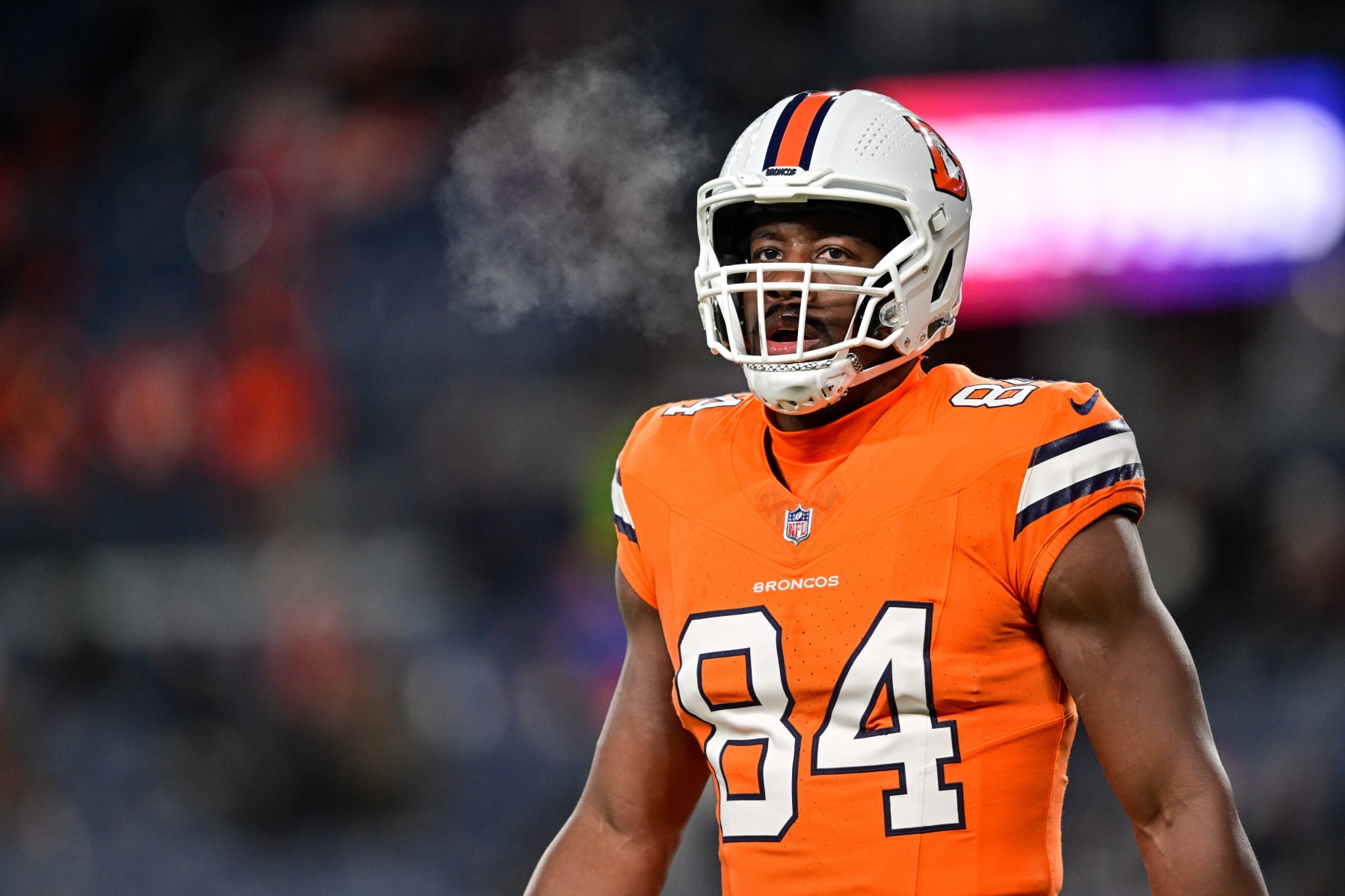 DENVER, COLORADO - DECEMBER 24: Chris Manhertz #84 of the Denver Broncos warms up before a game against the New England Patriots at Empower Field at Mile High on December 24, 2023 in Denver, Colorado. (Photo by Dustin Bradford/Getty Images) DENVER, COLORADO - DECEMBER 24: Chris Manhertz #84 of the Denver Broncos warms up before a game against the New England Patriots at Empower Field at Mile High on December 24, 2023 in Denver, Colorado. (Photo by Dustin Bradford/Getty Images)