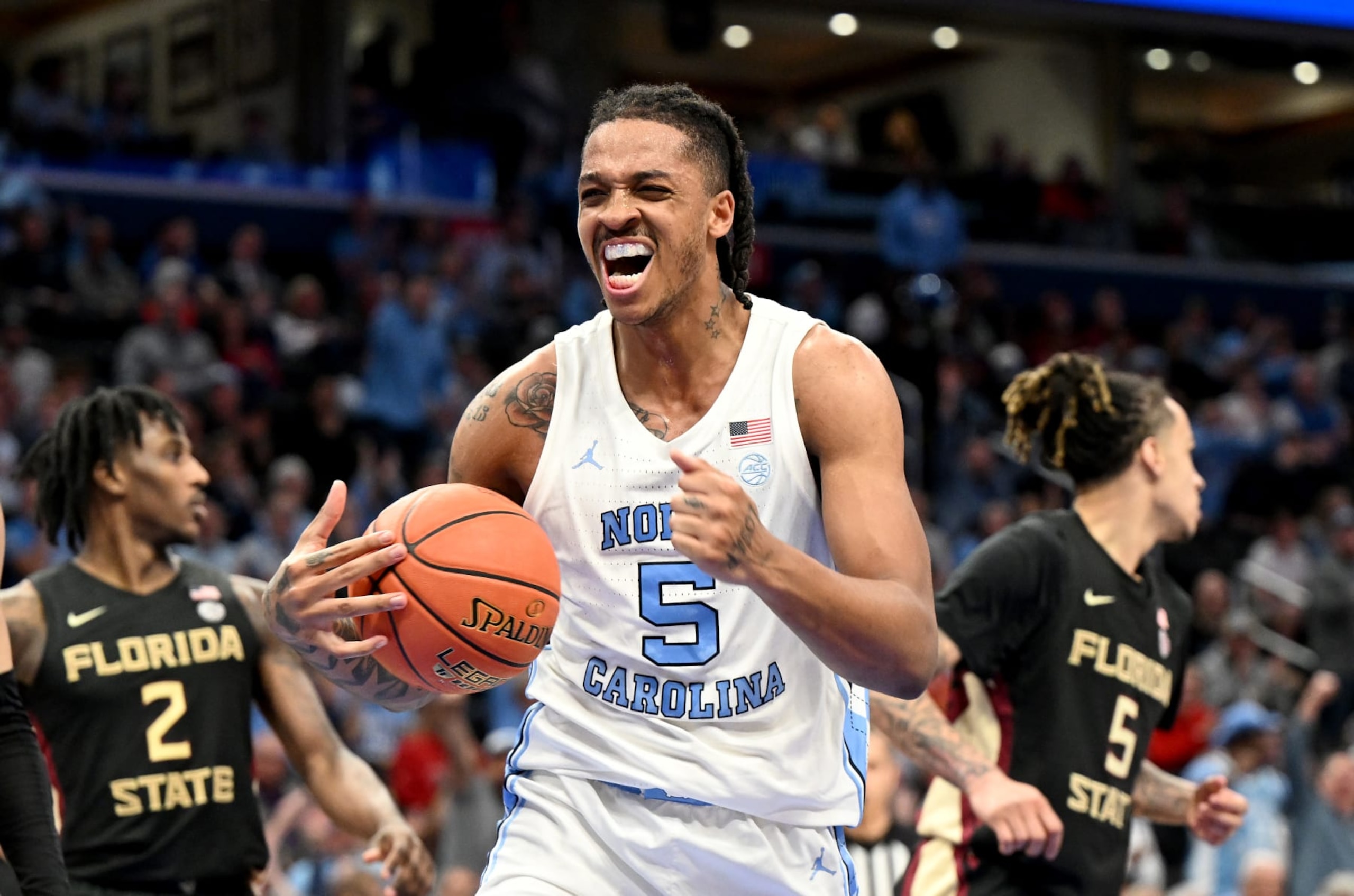 WASHINGTON, DC - MARCH 14: Armando Bacot #5 of the North Carolina Tar Heels celebrates in the first half against the Florida State Seminoles in the Quarterfinals of the ACC Men's Basketball Tournament  at Capital One Arena on March 14, 2024 in Washington, DC. (Photo by Greg Fiume/Getty Images)