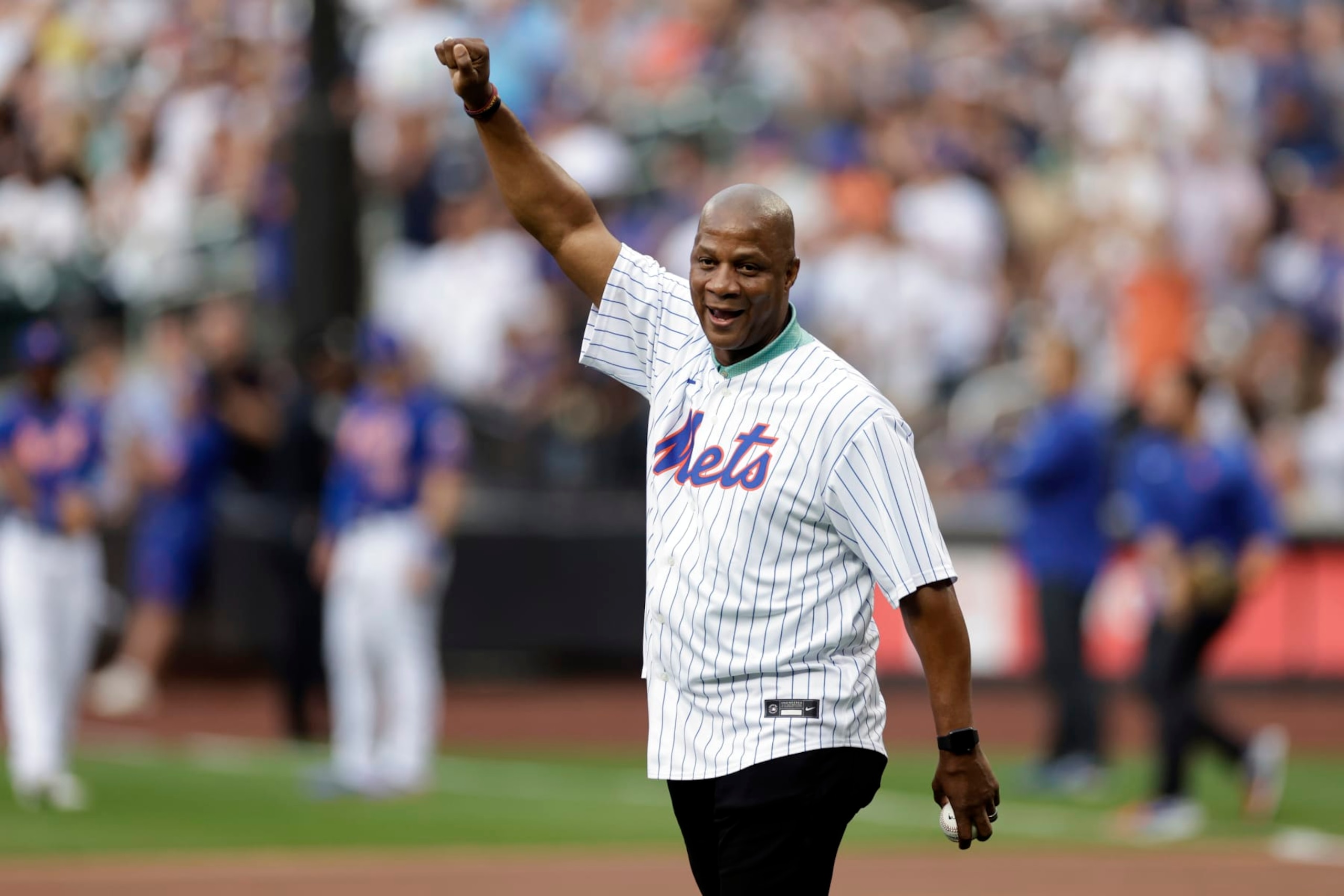 NEW YORK, NY - JULY 26: Former New York Mets Darryl Strawberry throws a ceremonial first pitch at Citi Field on July 26, 2022 in New York City. (Photo by Adam Hunger/Getty Images) NEW YORK, NY - JULY 26: Former New York Mets Darryl Strawberry throws a ceremonial first pitch at Citi Field on July 26, 2022 in New York City. (Photo by Adam Hunger/Getty Images)