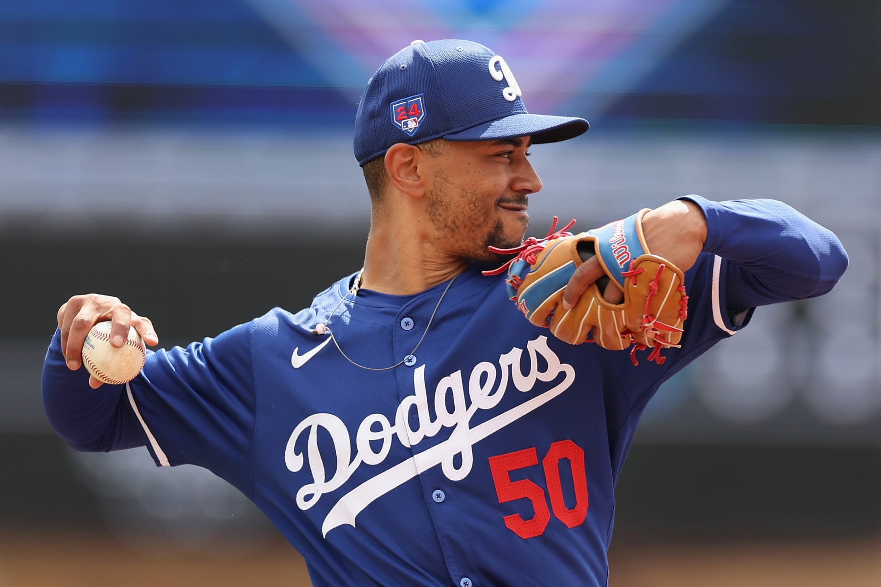 GLENDALE, ARIZONA - MARCH 12: Mookie Betts #50 of the Los Angeles Dodgers warms up before the MLB spring game against the San Francisco Giants at Camelback Ranch on March 12, 2024 in Glendale, Arizona. (Photo by Christian Petersen/Getty Images)