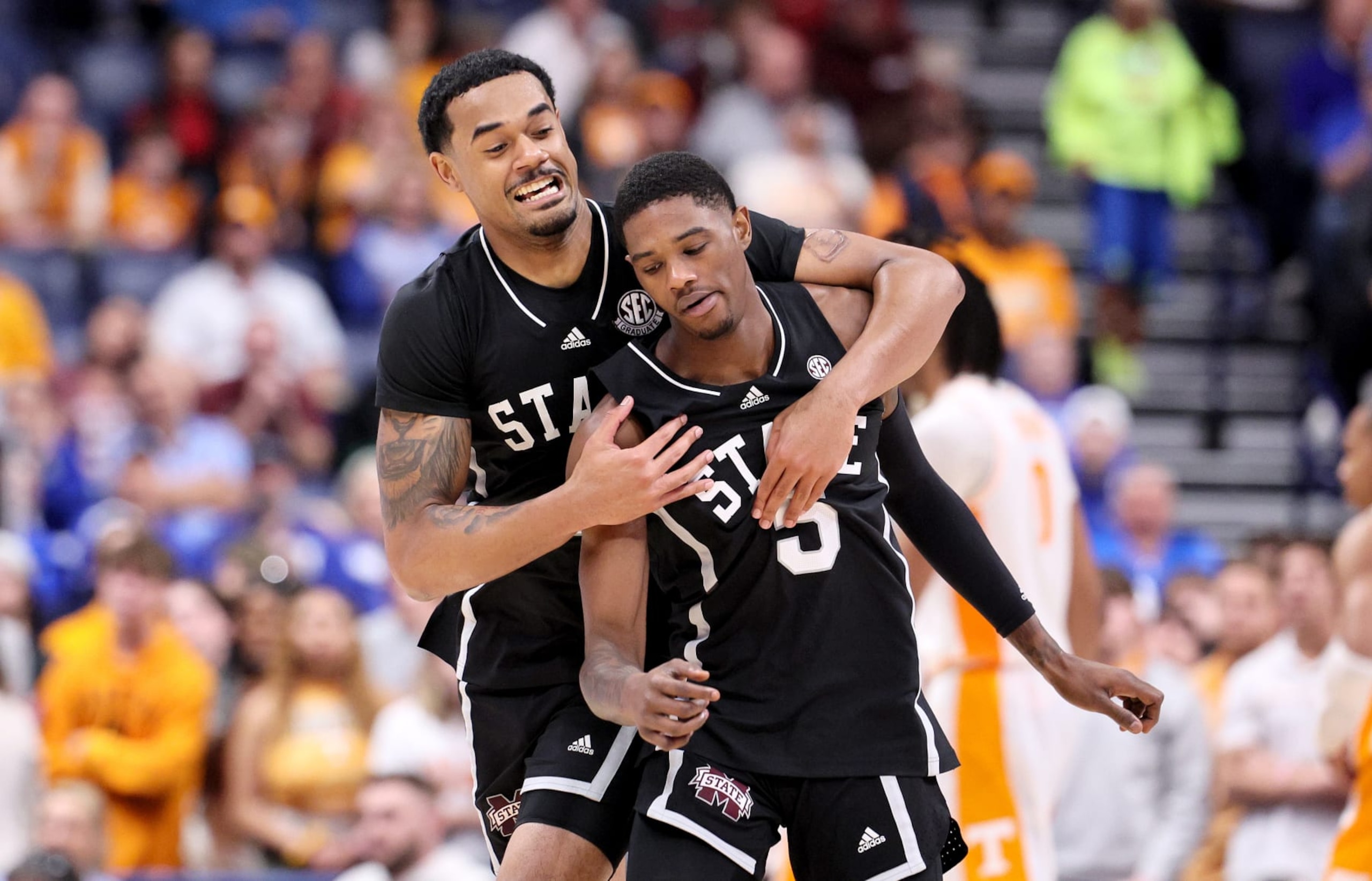 NASHVILLE, TENNESSEE - MARCH 15:  Tolu Smith #1 and Shawn Jones Jr #5 of the Mississippi State Bulldogs celebrate in the first half against the Tennessee Volunteers during the quarterfinals of the SEC Basketball Tournament at Bridgestone Arena on March 15, 2024 in Nashville, Tennessee. (Photo by Andy Lyons/Getty Images)