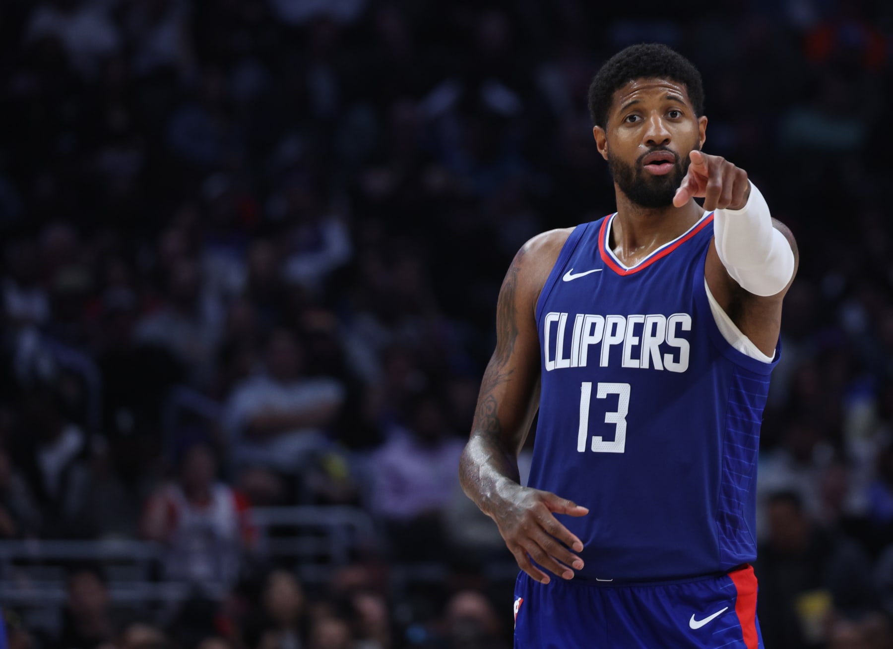 LOS ANGELES, CALIFORNIA - MARCH 12: Paul George #13 of the LA Clippers reacts during a 118-100 loss to the Minnesota Timberwolves at Crypto.com Arena on March 12, 2024 in Los Angeles, California. (Photo by Harry How/Getty Images)