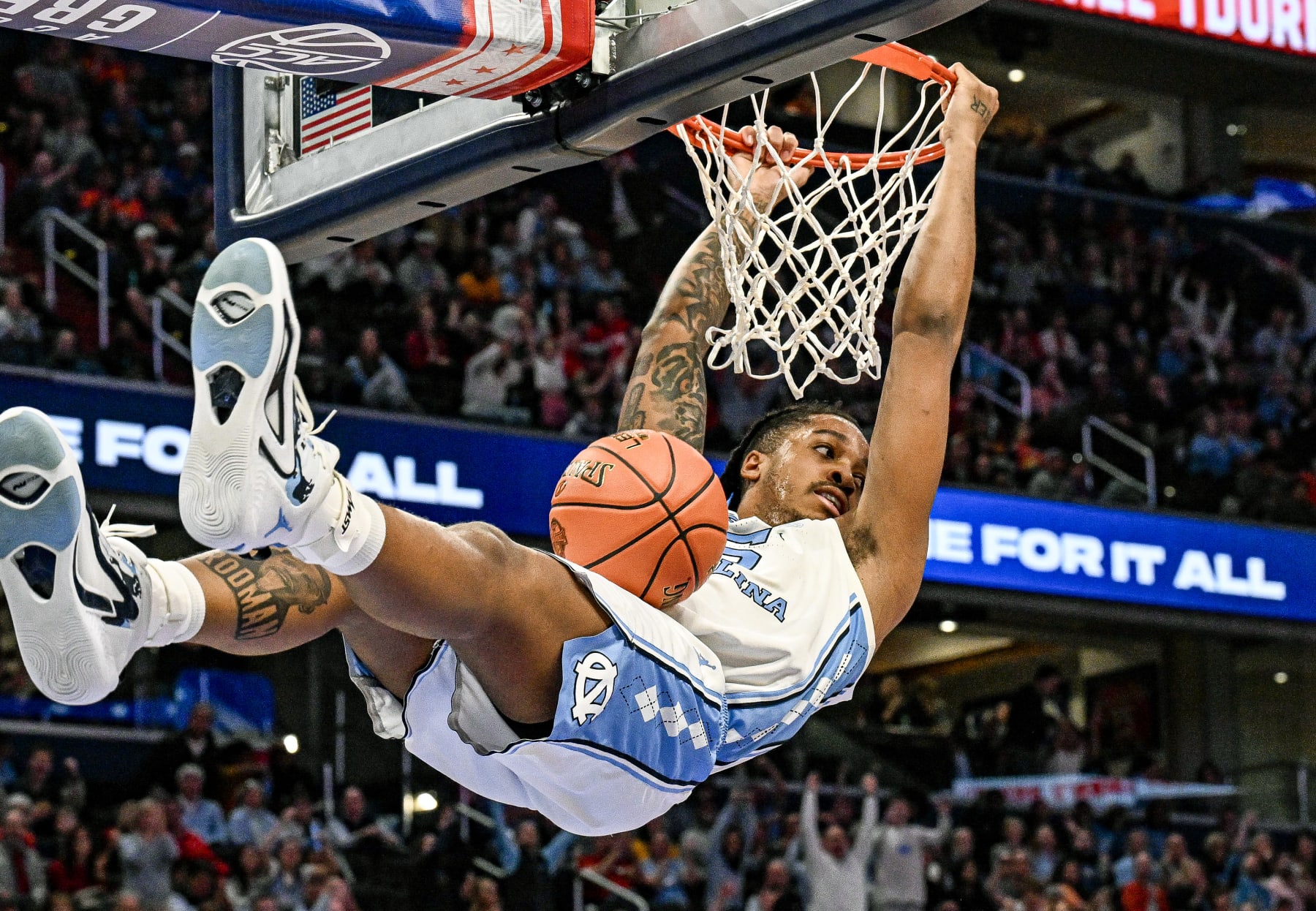 WASHINGTON, DC - MARCH 15: North Carolina Tar Heels forward Armando Bacot (5) dunks the ball in action against the Pittsburgh Panthers in the first game of the ACC Tournament Semi Final on March 15, 2024 at the Capital One Arena in Washington, D.C.  (Photo by Mark Goldman/Icon Sportswire via Getty Images)