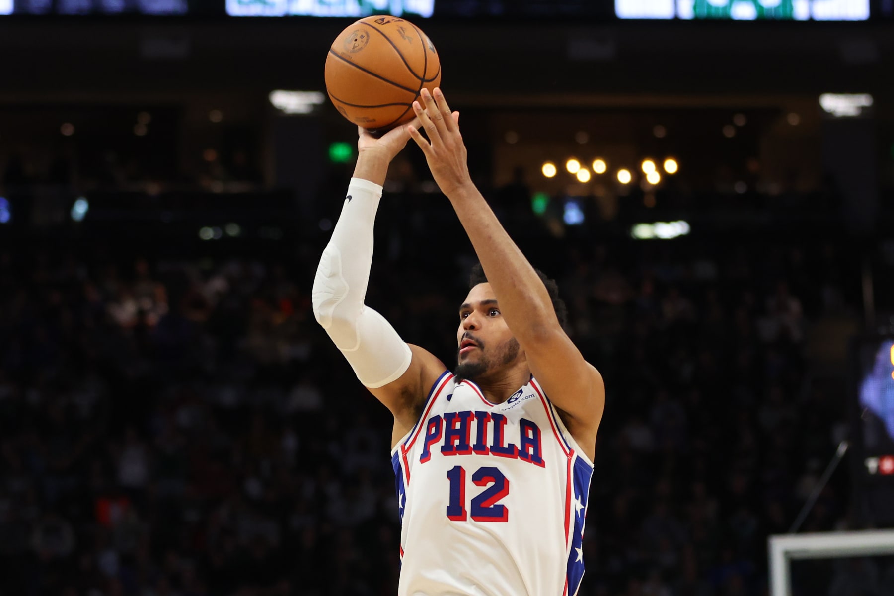 MILWAUKEE, WISCONSIN - MARCH 14: Tobias Harris #12 of the Philadelphia 76ers takes a three point shot during the second half of a game against the Milwaukee Bucks at Fiserv Forum on March 14, 2024 in Milwaukee, Wisconsin. NOTE TO USER: User expressly acknowledges and agrees that, by downloading and or using this photograph, User is consenting to the terms and conditions of the Getty Images License Agreement. (Photo by Stacy Revere/Getty Images)