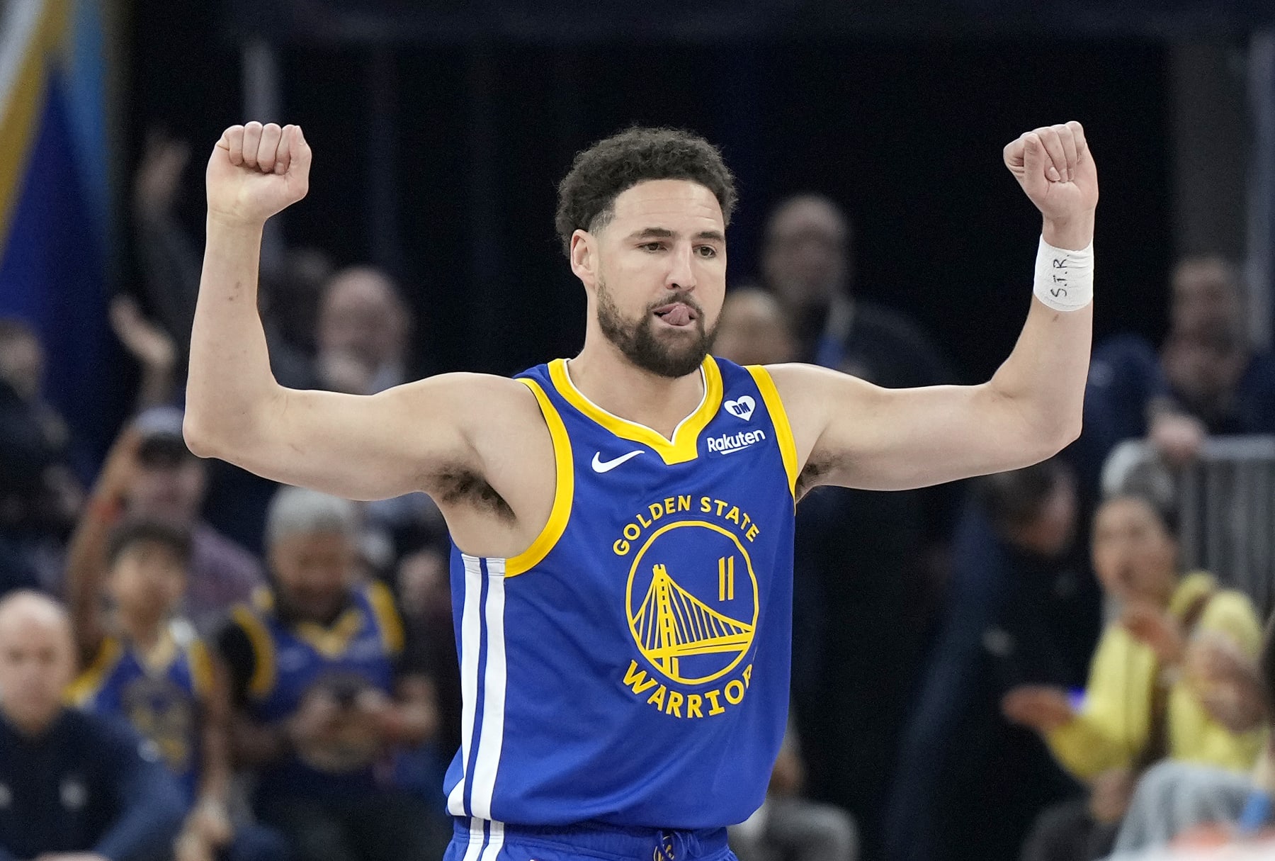 SAN FRANCISCO, CALIFORNIA - MARCH 09: Klay Thompson #11 of the Golden State Warriors reacts after making a three-point shot against the San Antonio Spurs during the first quarter at Chase Center on March 09, 2024 in San Francisco, California. NOTE TO USER: User expressly acknowledges and agrees that, by downloading and or using this photograph, User is consenting to the terms and conditions of the Getty Images License Agreement. (Photo by Thearon W. Henderson/Getty Images)