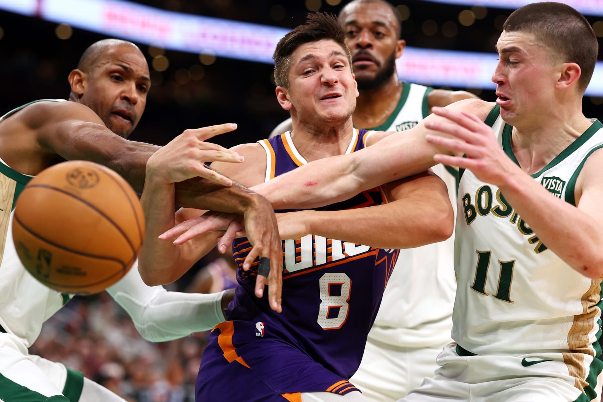 BOSTON, MASSACHUSETTS - MARCH 14: Grayson Allen #8 of the Phoenix Suns, Payton Pritchard #11 of the Boston Celtics and Al Horford #42 battle for a loose ball during the second quarter at TD Garden on March 14, 2024 in Boston, Massachusetts. NOTE TO USER: User expressly acknowledges and agrees that, by downloading and or using this photograph, user is consenting to the terms and conditions of the Getty Images License Agreement. (Photo by Maddie Meyer/Getty Images) BOSTON, MASSACHUSETTS - MARCH 14: Grayson Allen #8 of the Phoenix Suns, Payton Pritchard #11 of the Boston Celtics and Al Horford #42 battle for a loose ball during the second quarter at TD Garden on March 14, 2024 in Boston, Massachusetts. NOTE TO USER: User expressly acknowledges and agrees that, by downloading and or using this photograph, user is consenting to the terms and conditions of the Getty Images License Agreement. (Photo by Maddie Meyer/Getty Images)