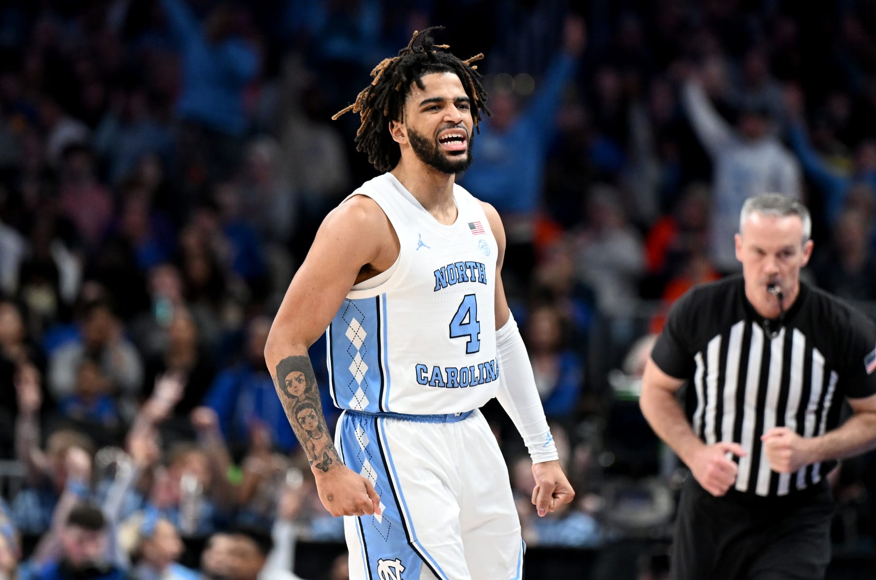 WASHINGTON, DC - MARCH 15: RJ Davis #4 of the North Carolina Tar Heels celebrates in the second half against the Pittsburgh Panthers in the Semifinals of the ACC Men's Basketball Tournament  at Capital One Arena on March 15, 2024 in Washington, DC.  (Photo by Greg Fiume/Getty Images)