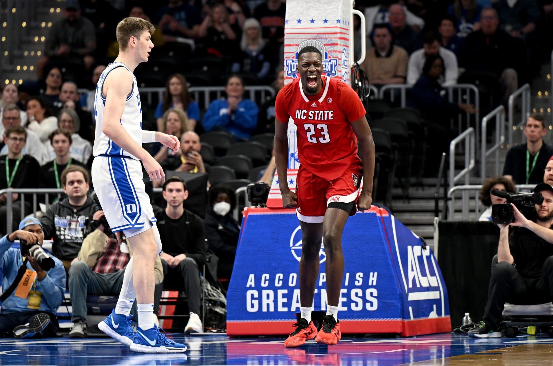 WASHINGTON, DC - MARCH 14: Mohamed Diarra #23 of the North Carolina State Wolfpack celebrates in the first half against the Duke Blue Devils in the Quarterfinals of the ACC Men's Basketball Tournament  at Capital One Arena on March 14, 2024 in Washington, DC. (Photo by Greg Fiume/Getty Images)
