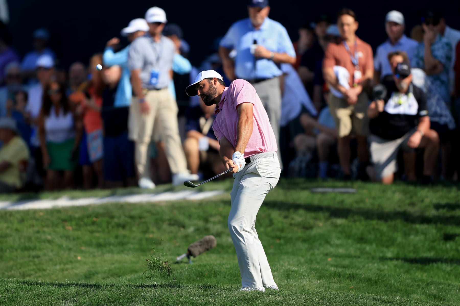 PONTE VEDRA BEACH, FLORIDA - MARCH 15: Scottie Scheffler of the United States plays a shot on the 16th hole during the second round of THE PLAYERS Championship on the Stadium Course at TPC Sawgrass on March 15, 2024 in Ponte Vedra Beach, Florida. (Photo by Sam Greenwood/Getty Images)