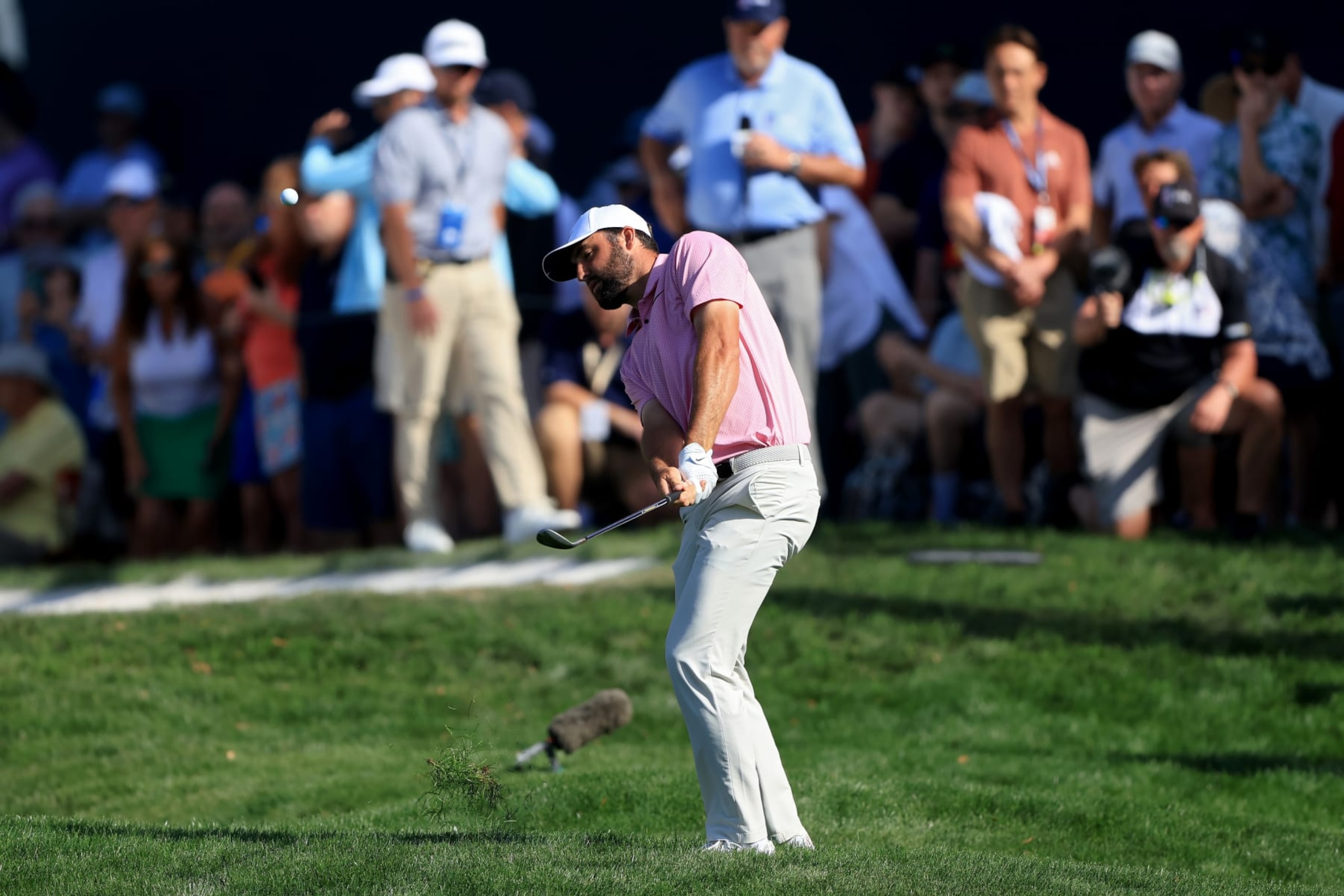 PONTE VEDRA BEACH, FLORIDA - MARCH 15: Scottie Scheffler of the United States plays a shot on the 16th hole during the second round of THE PLAYERS Championship on the Stadium Course at TPC Sawgrass on March 15, 2024 in Ponte Vedra Beach, Florida. (Photo by Sam Greenwood/Getty Images)