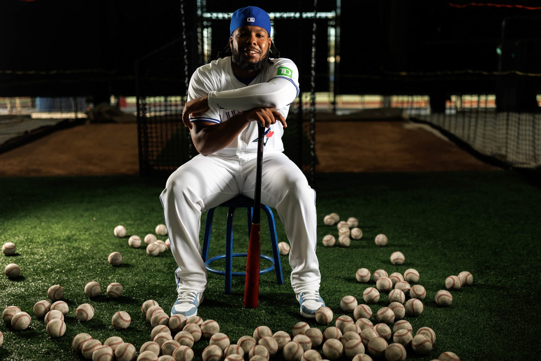 DUNEDIN, FL - FEBRUARY 23: Vladimir Guerrero Jr. #27 of the Toronto Blue Jays poses for a photo during the Toronto Blue Jays Photo Day at TD Ballpark on Friday, February 23, 2024 in Dunedin, Florida. (Photo by Mike Carlson/MLB Photos via Getty Images)