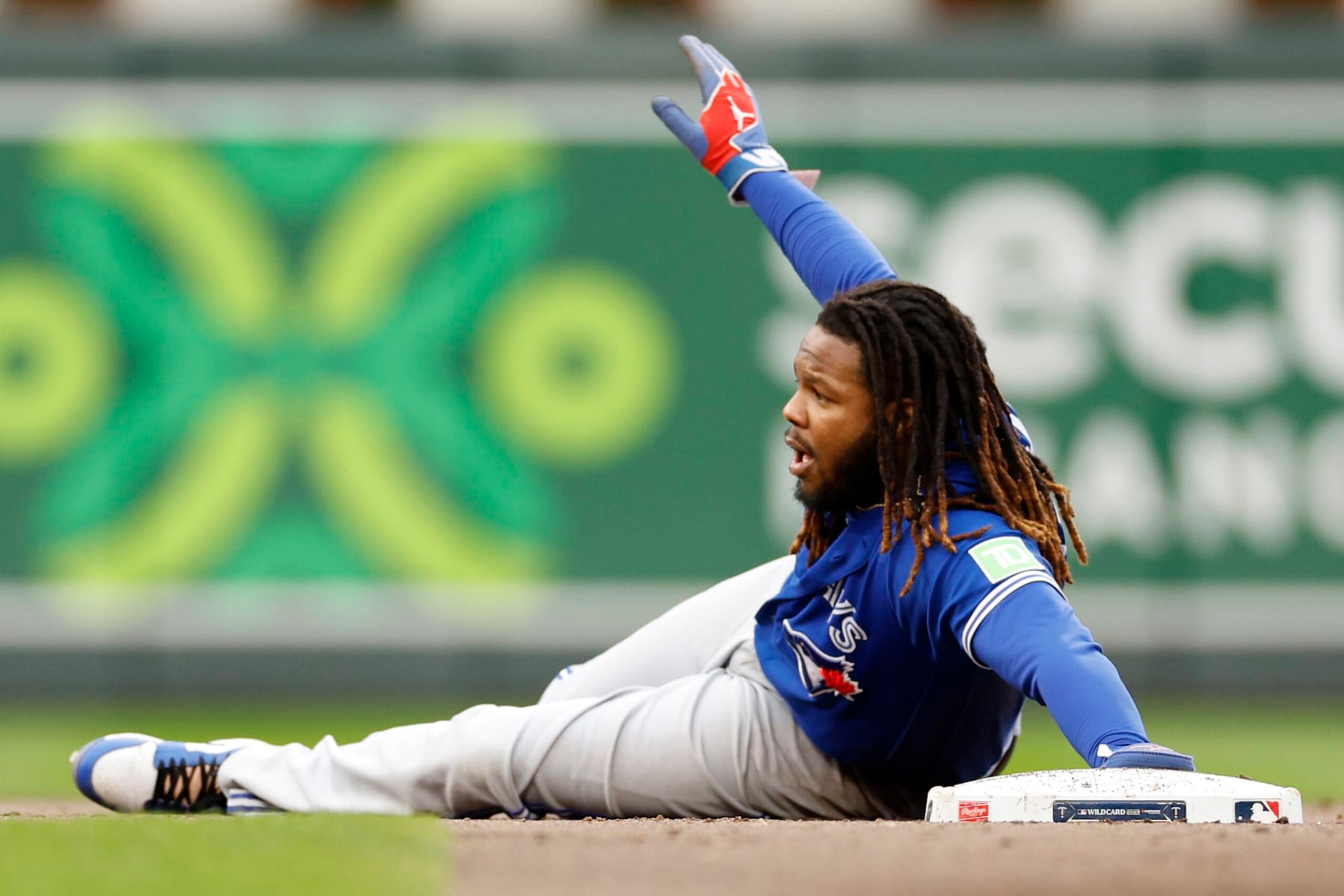 MINNEAPOLIS, MINNESOTA - OCTOBER 04: Vladimir Guerrero Jr. #27 of the Toronto Blue Jays reacts after being tagged out by Carlos Correa #4 of the Minnesota Twins during the fifth inning in Game Two of the Wild Card Series at Target Field on October 04, 2023 in Minneapolis, Minnesota. (Photo by David Berding/Getty Images) MINNEAPOLIS, MINNESOTA - OCTOBER 04: Vladimir Guerrero Jr. #27 of the Toronto Blue Jays reacts after being tagged out by Carlos Correa #4 of the Minnesota Twins during the fifth inning in Game Two of the Wild Card Series at Target Field on October 04, 2023 in Minneapolis, Minnesota. (Photo by David Berding/Getty Images)