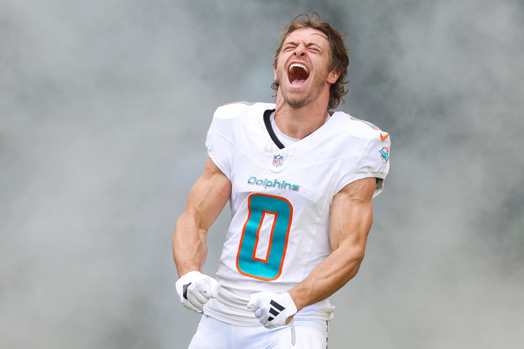 MIAMI GARDENS, FLORIDA - DECEMBER 17: Braxton Berrios #0 of the Miami Dolphins runs out of the tunnel during player introductions prior to a game against the New York Jets at Hard Rock Stadium on December 17, 2023 in Miami Gardens, Florida. (Photo by Brandon Sloter/Image Of Sport/Getty Images) MIAMI GARDENS, FLORIDA - DECEMBER 17: Braxton Berrios #0 of the Miami Dolphins runs out of the tunnel during player introductions prior to a game against the New York Jets at Hard Rock Stadium on December 17, 2023 in Miami Gardens, Florida. (Photo by Brandon Sloter/Image Of Sport/Getty Images)