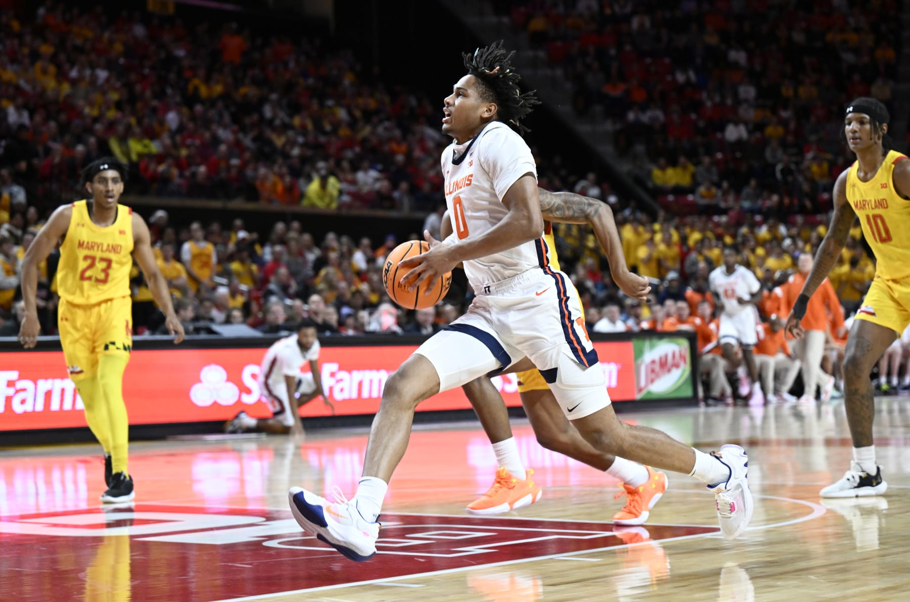 COLLEGE PARK, MARYLAND - DECEMBER 02: Terrence Shannon Jr. #0 of the Illinois Fighting Illini handles the ball against the Maryland Terrapins at Xfinity Center on December 02, 2022 in College Park, Maryland. (Photo by G Fiume/Getty Images)