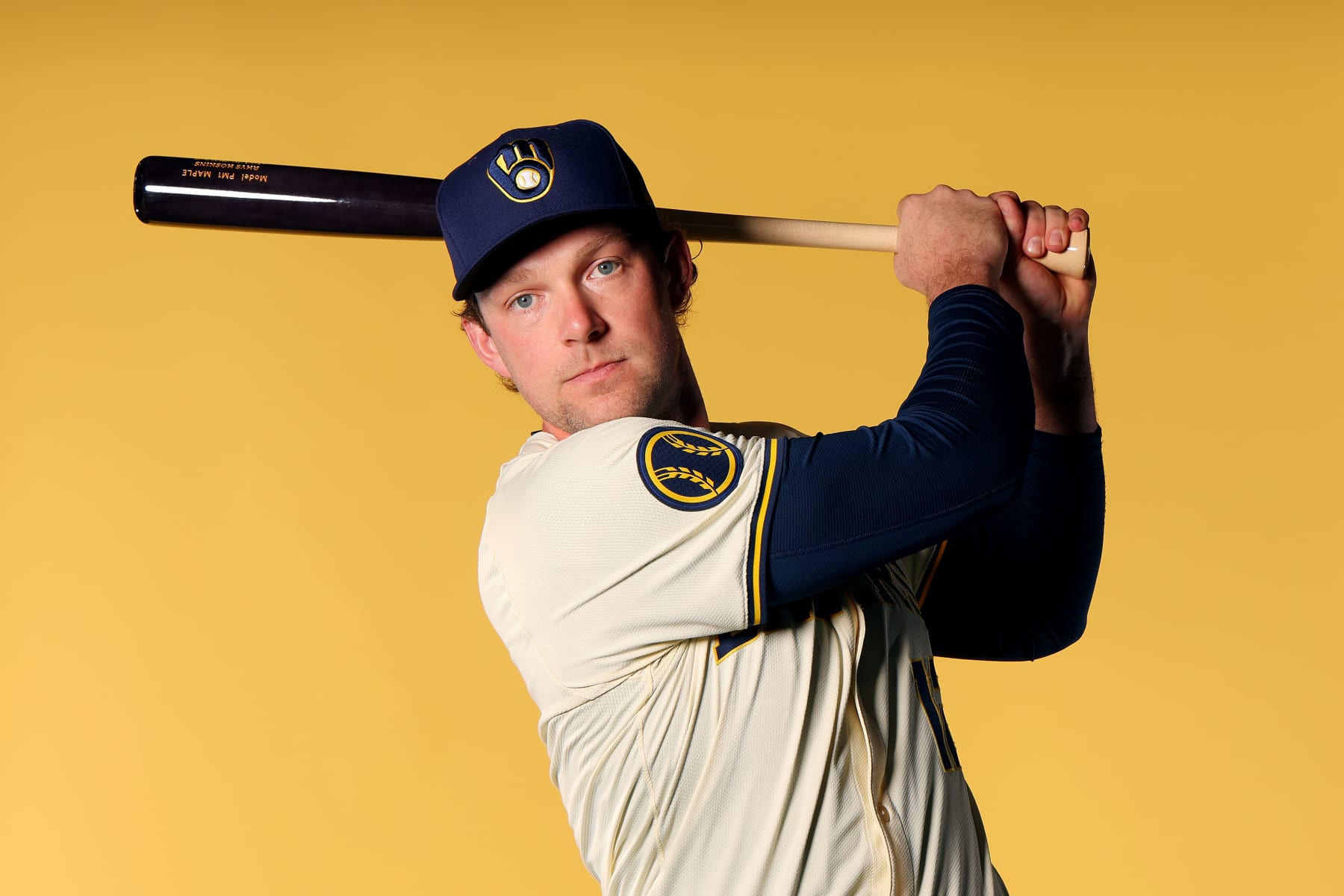 PHOENIX, ARIZONA - FEBRUARY 22: Rhys Hoskins #12 of the Milwaukee Brewers poses for a portrait during Photo Day at American Family Fields of Phoenix on February 22, 2024 in Phoenix, Arizona. (Photo by Michael Reaves/Getty Images)