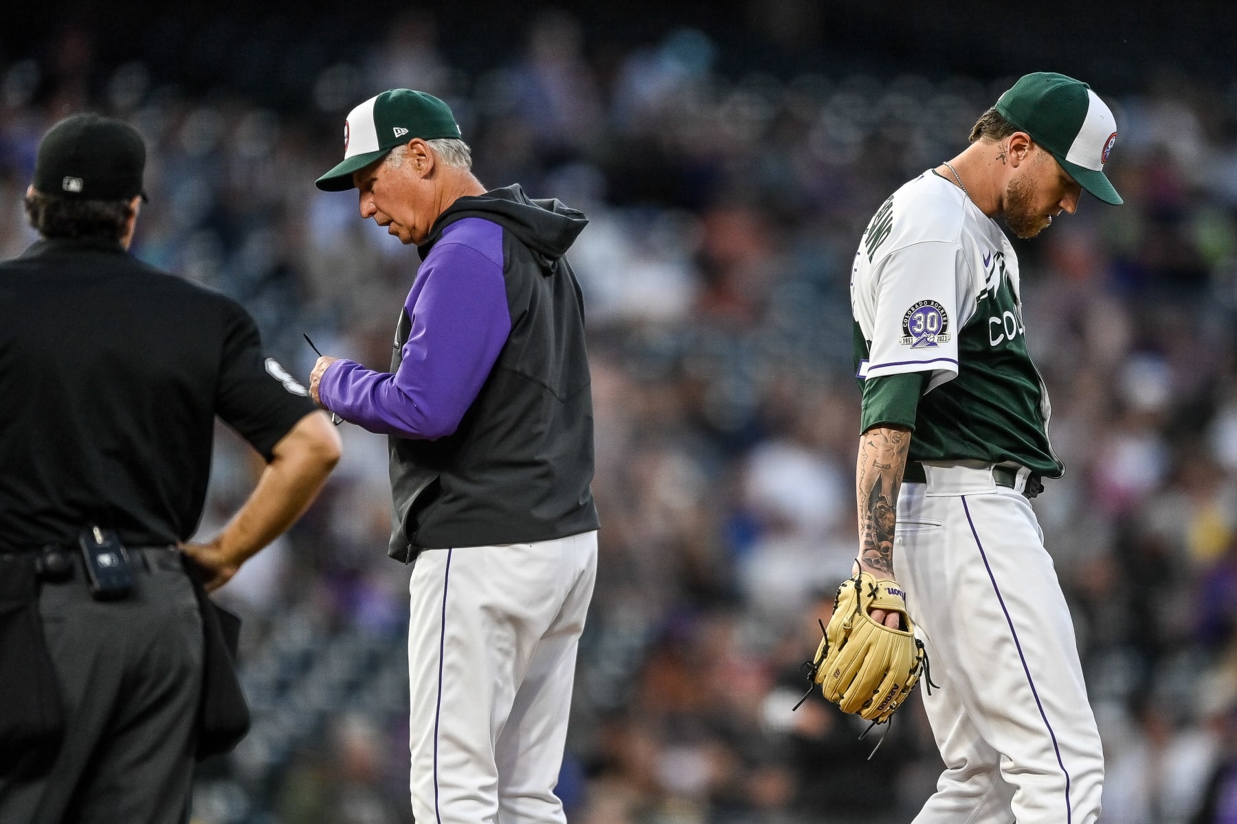 DENVER, CO - MAY 3: Kyle Freeland #21 of the Colorado Rockies takes a moment between pitches as manager Bud Black #10 of the Colorado Rockies has a word with the umpire in the fifth inning against the Milwaukee Brewers at Coors Field on May 3, 2023 in Denver, Colorado. (Photo by Dustin Bradford/Getty Images)