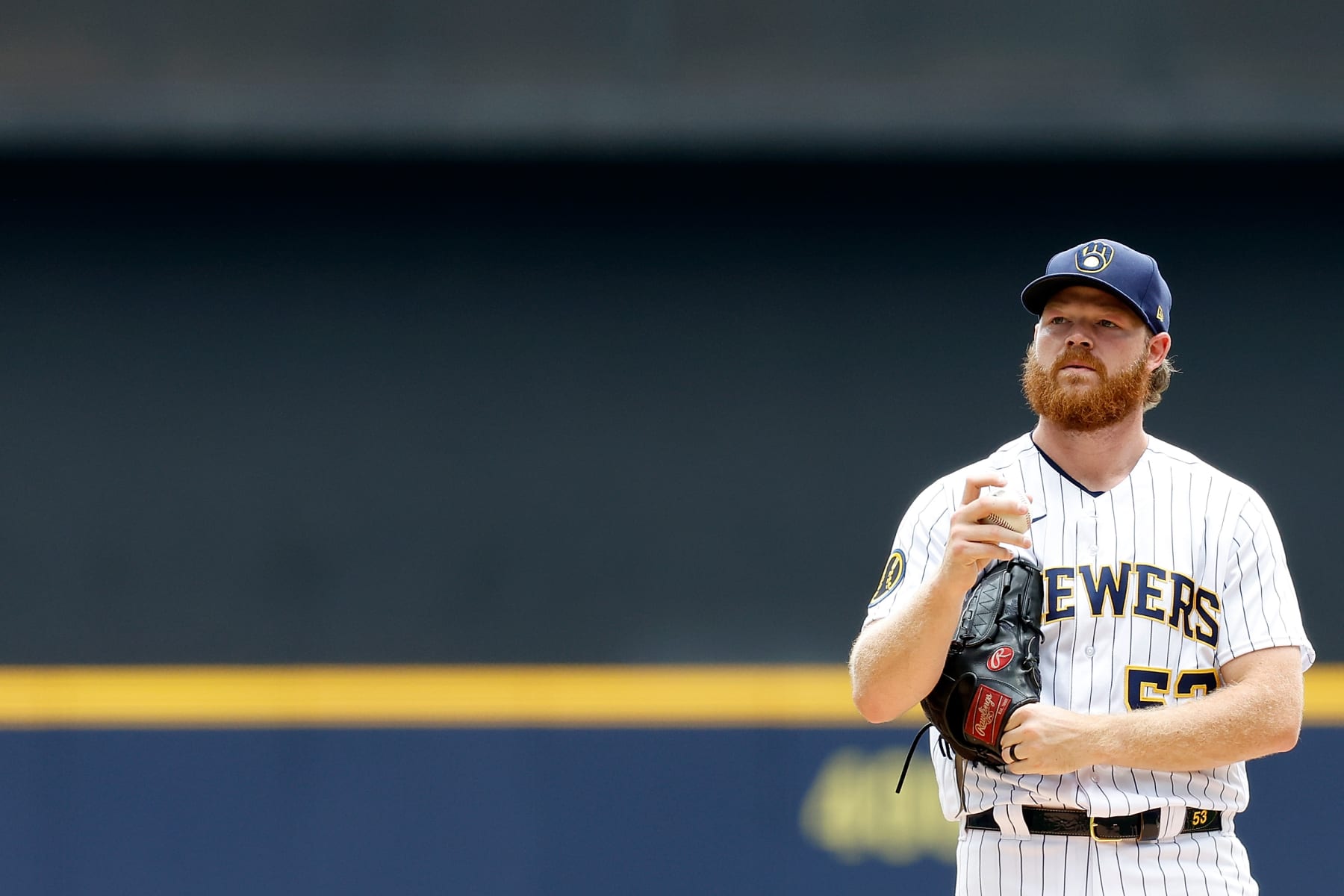 MILWAUKEE, WISCONSIN - AUGUST 06: Brandon Woodruff #53 of the Milwaukee Brewers stands on the mound during the first inning against the Pittsburgh Pirates at American Family Field on August 06, 2023 in Milwaukee, Wisconsin. (Photo by John Fisher/Getty Images)